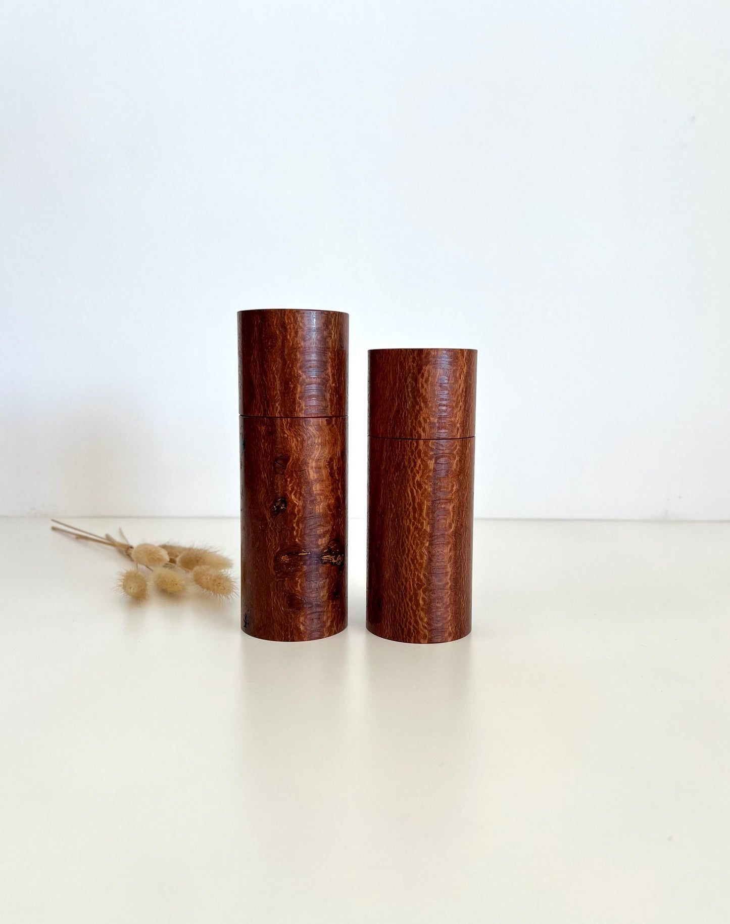 Wooden cylindrical shape salt and pepper grinders made from Banksia timber