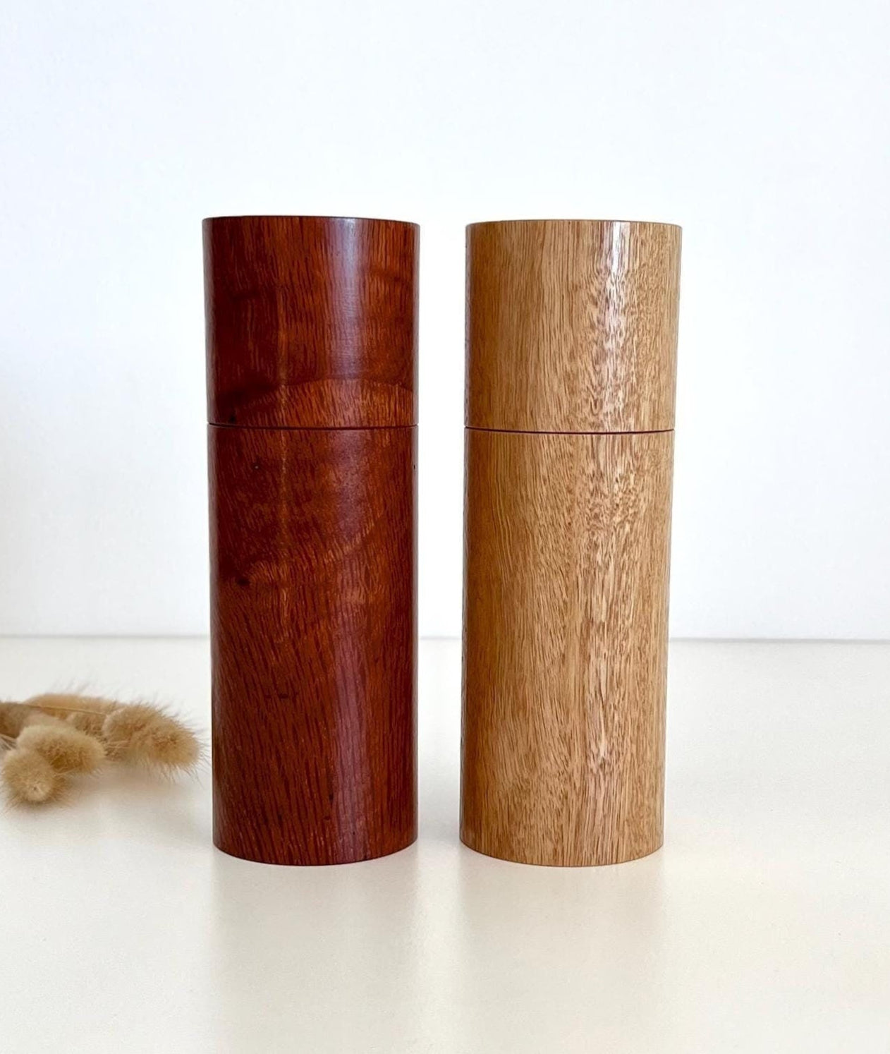 Wooden cylindrical shape salt and pepper grinders made from Blackbutt and Sheoak timbers