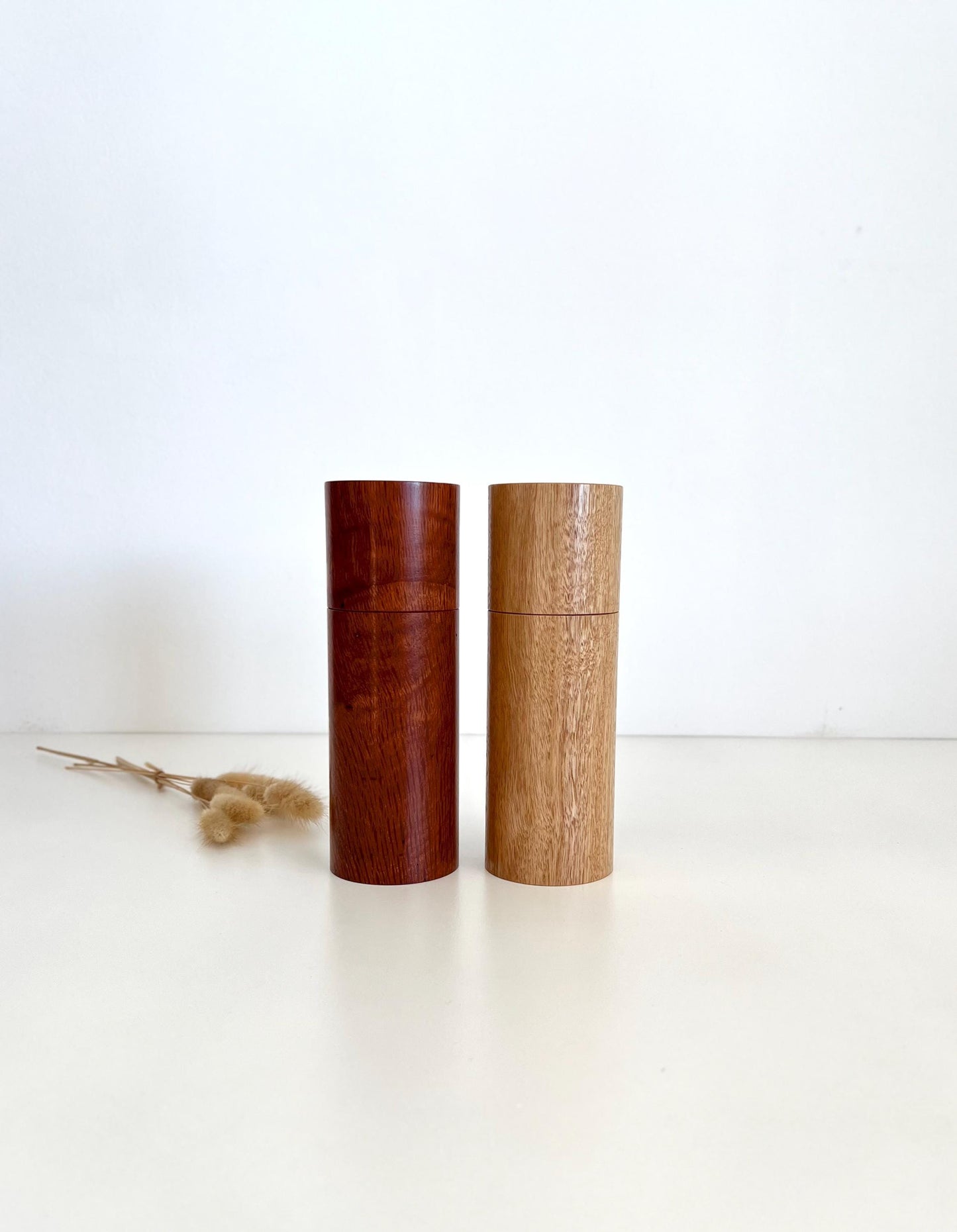 Wooden cylindrical shape salt and pepper grinders made from Blackbutt and Sheoak timbers