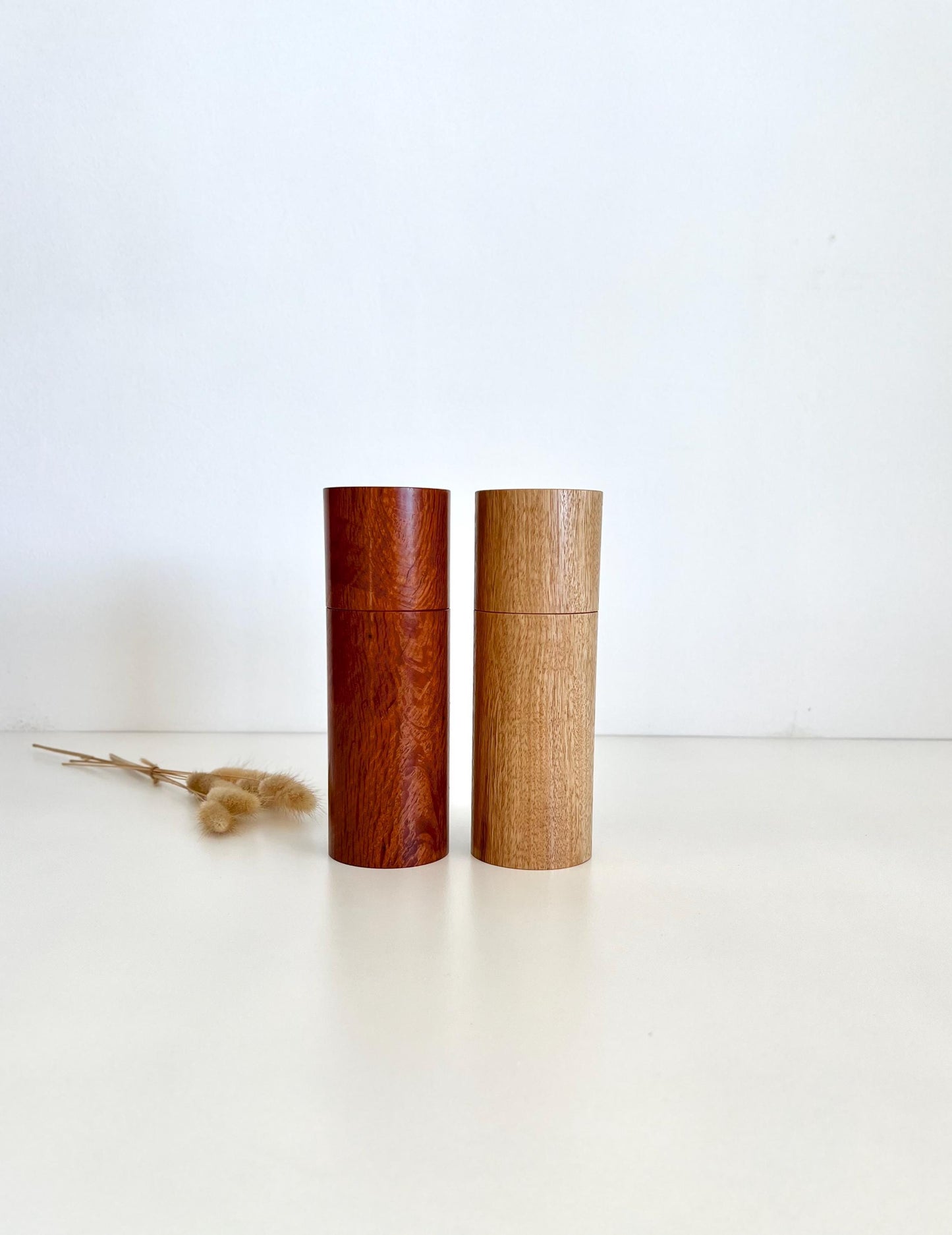 Wooden cylindrical shape salt and pepper grinders made from Blackbutt and Sheoak timbers