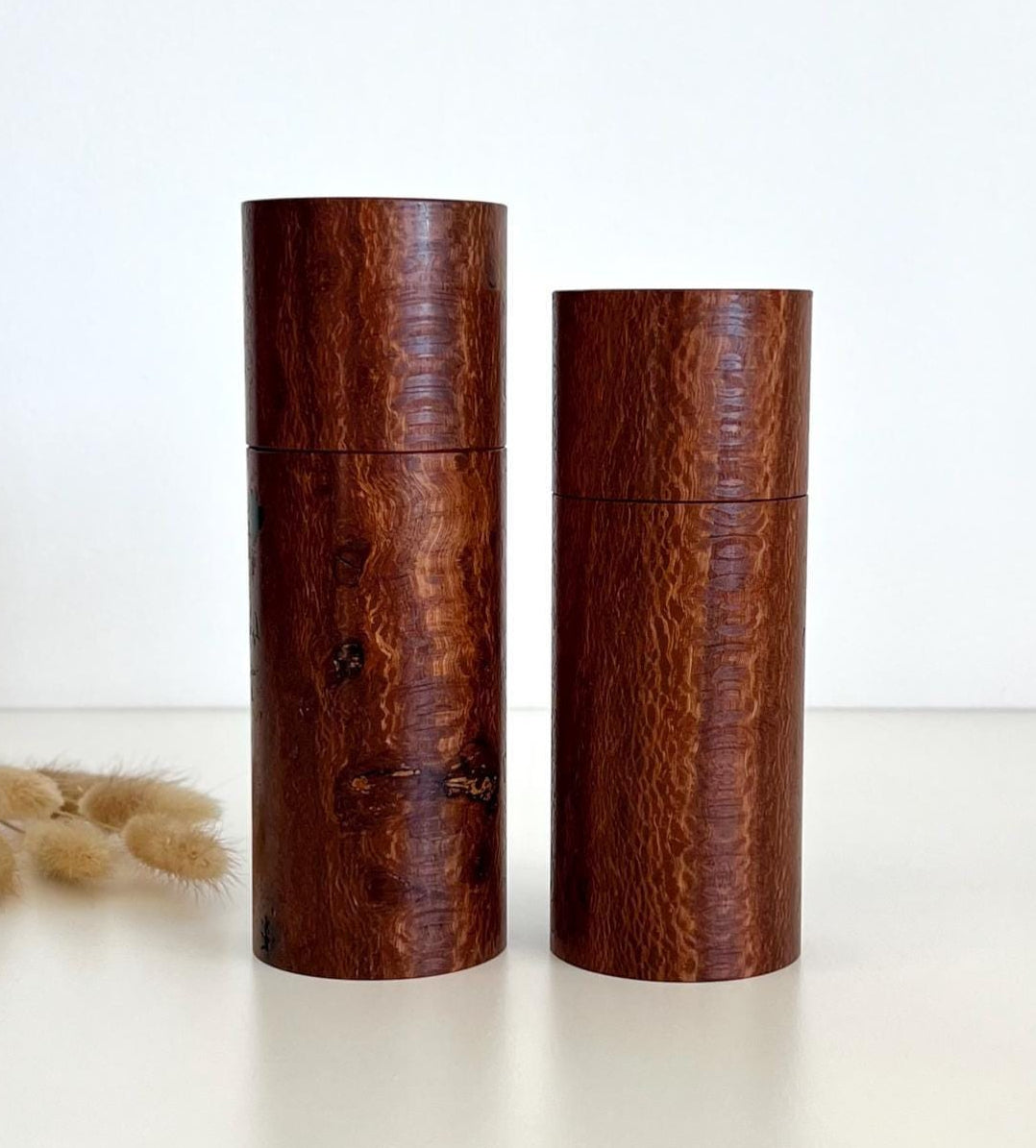 Wooden cylindrical shape salt and pepper grinders made from Banksia timber