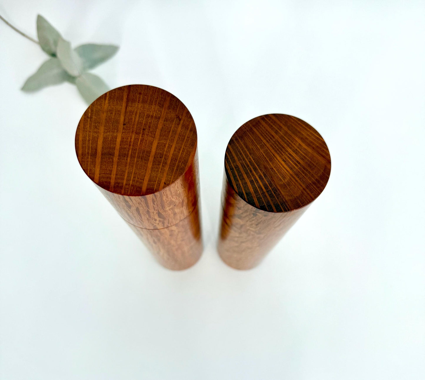 Birdseye view of wooden cylindrical shape salt and pepper grinders made from Australian Sheoak timber