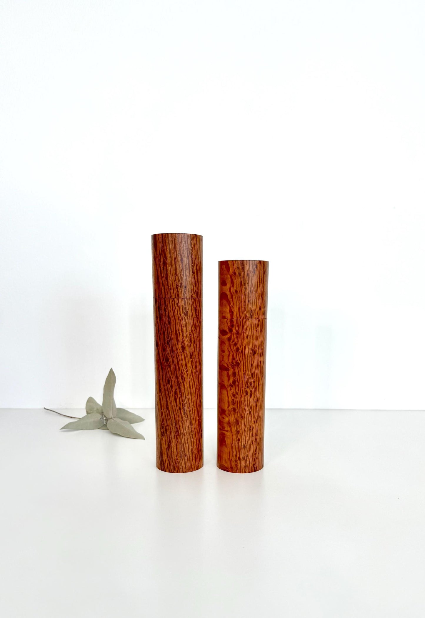 Wooden cylindrical shape salt and pepper grinders made from Sheoak timber