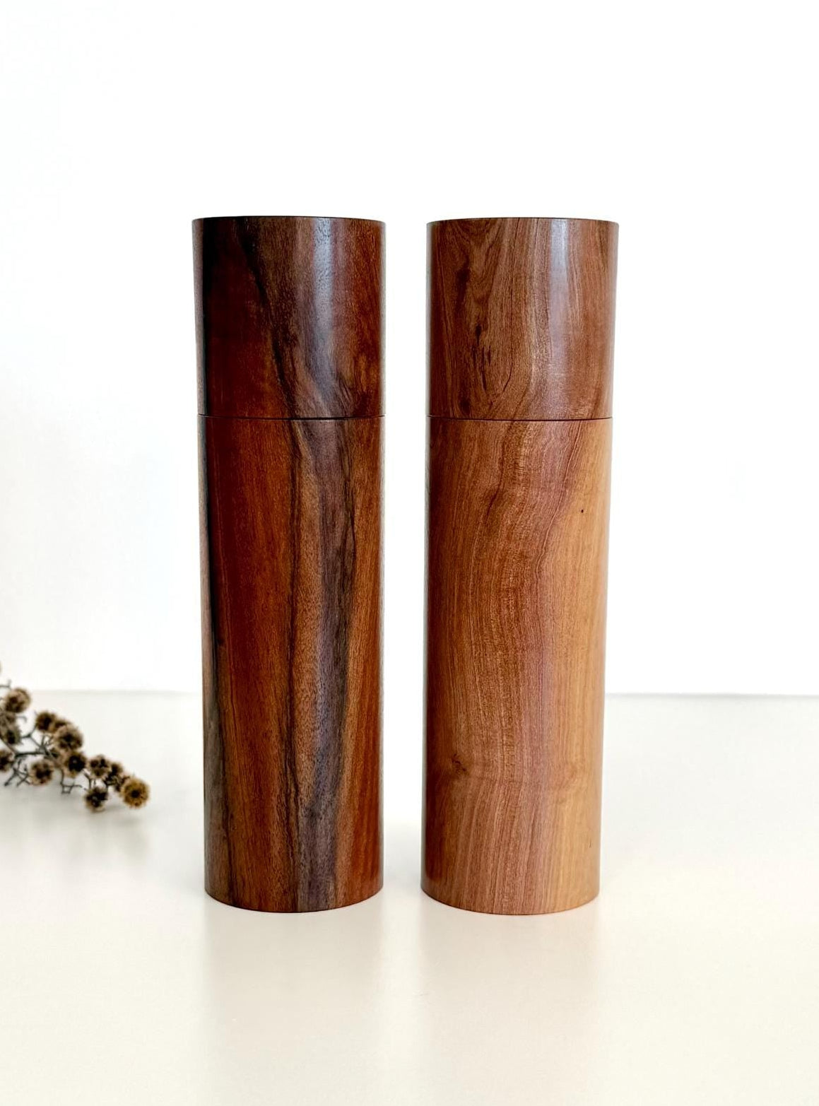 Wooden cylindrical shape salt and pepper grinders made from Peppermint timber