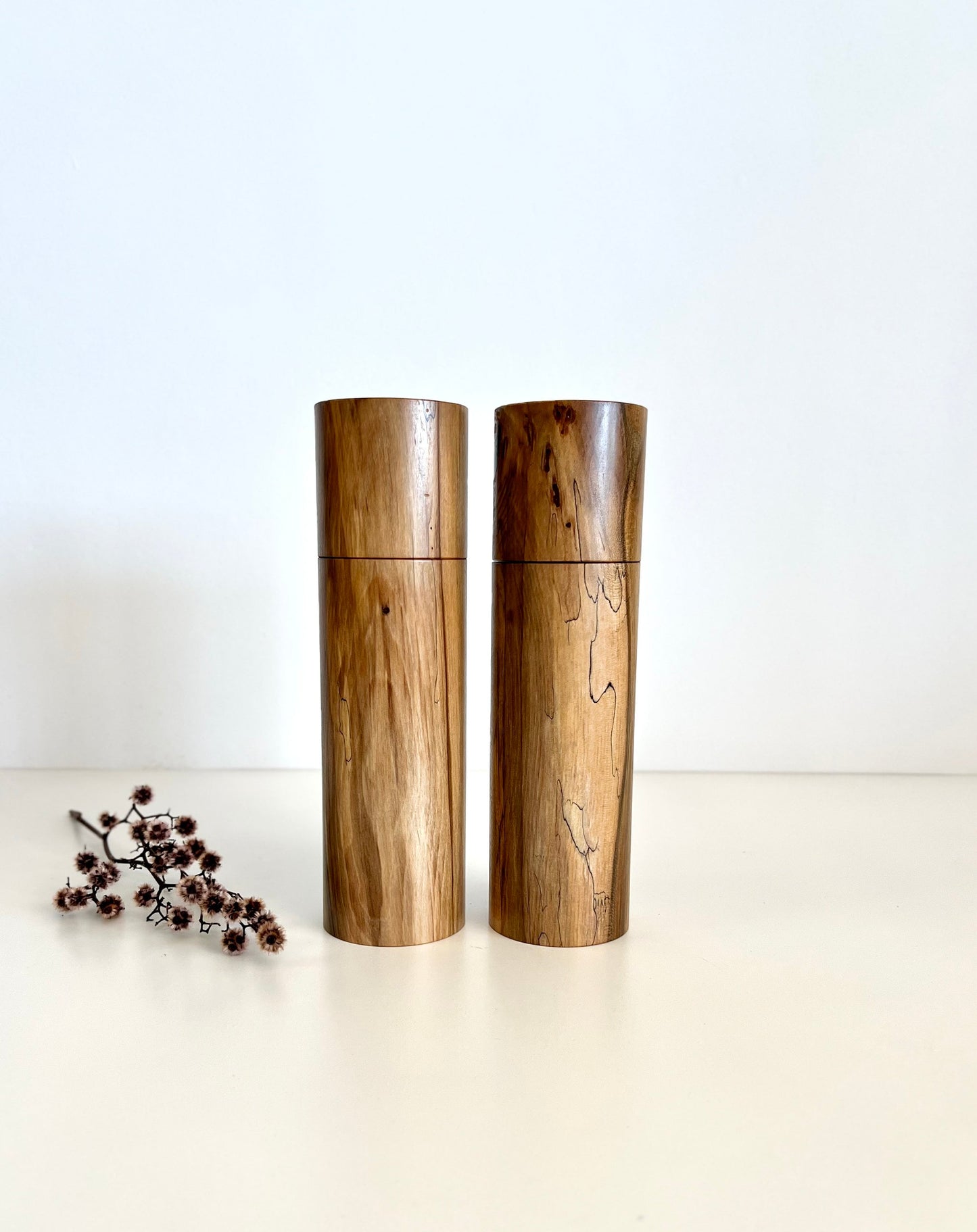 Wooden cylindrical shape salt and pepper grinders made from Australian Black Heart Sassafras timber