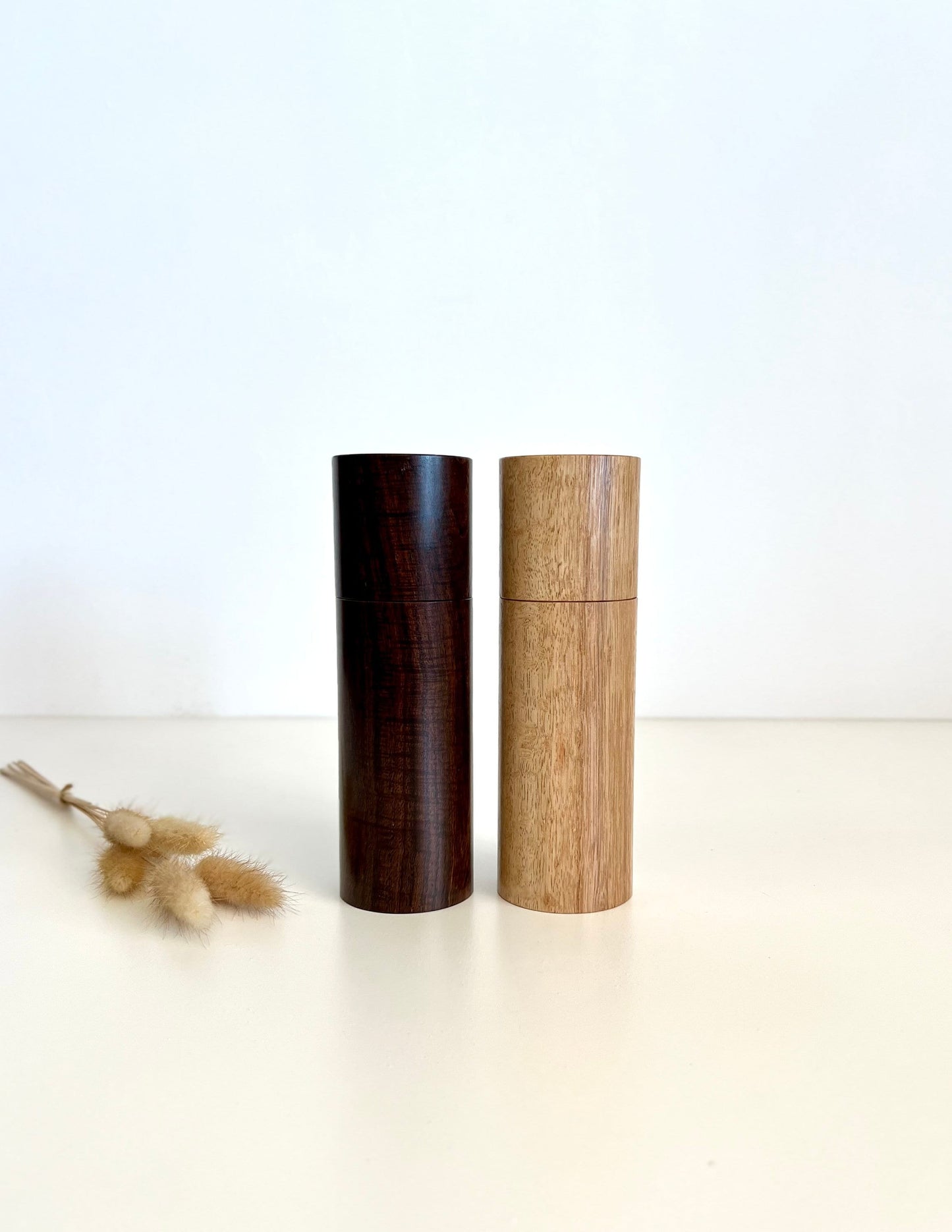 Wooden cylindrical shape salt and pepper grinders made from Australian Western Myall and bluegum timbers