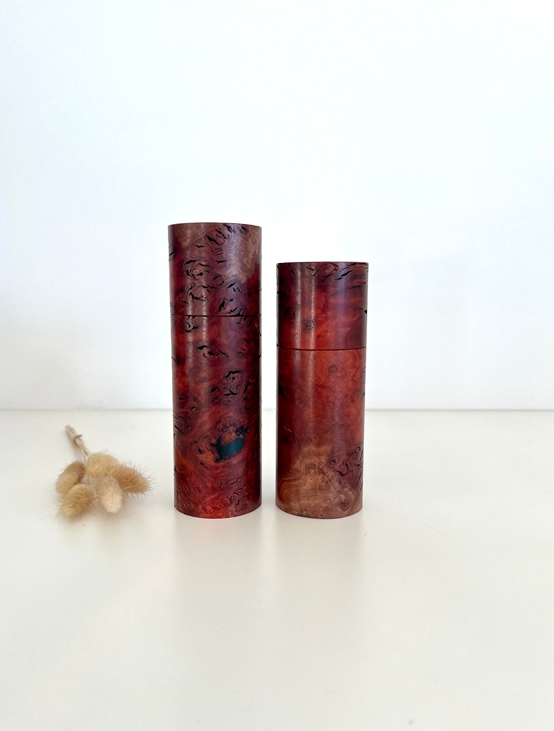 Wooden cylindrical shape salt and pepper grinders made from Australian Jarrah burl timbers