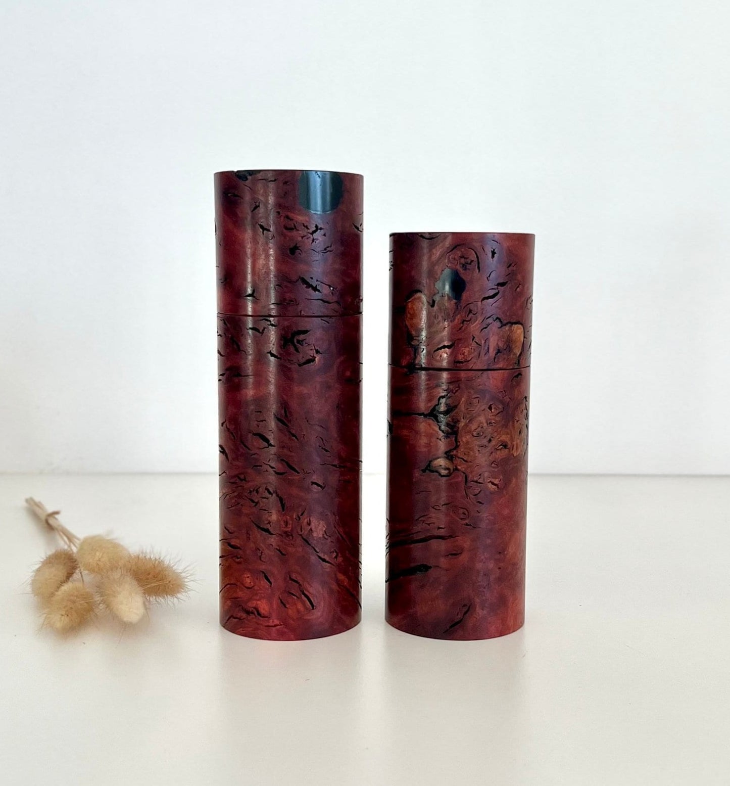 Wooden cylindrical shape salt and pepper grinders made from Australian Jarrah burl timbers