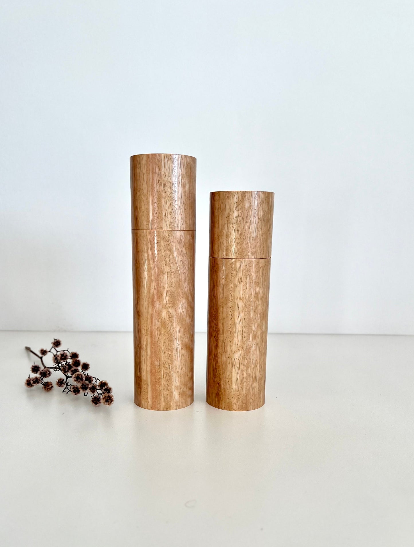 Wooden cylindrical shape salt and pepper grinders made from Australian Tasmanian Blue gum timber