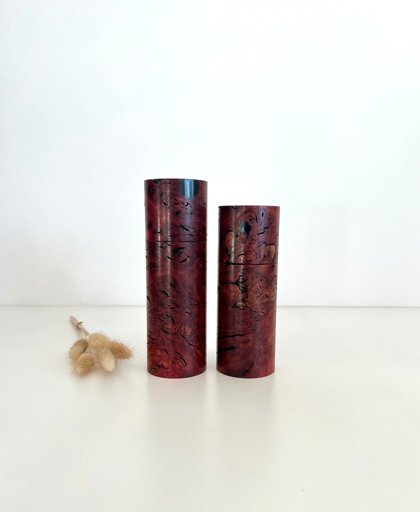 Wooden cylindrical shape salt and pepper grinders made from Australian Jarrah burl timbers