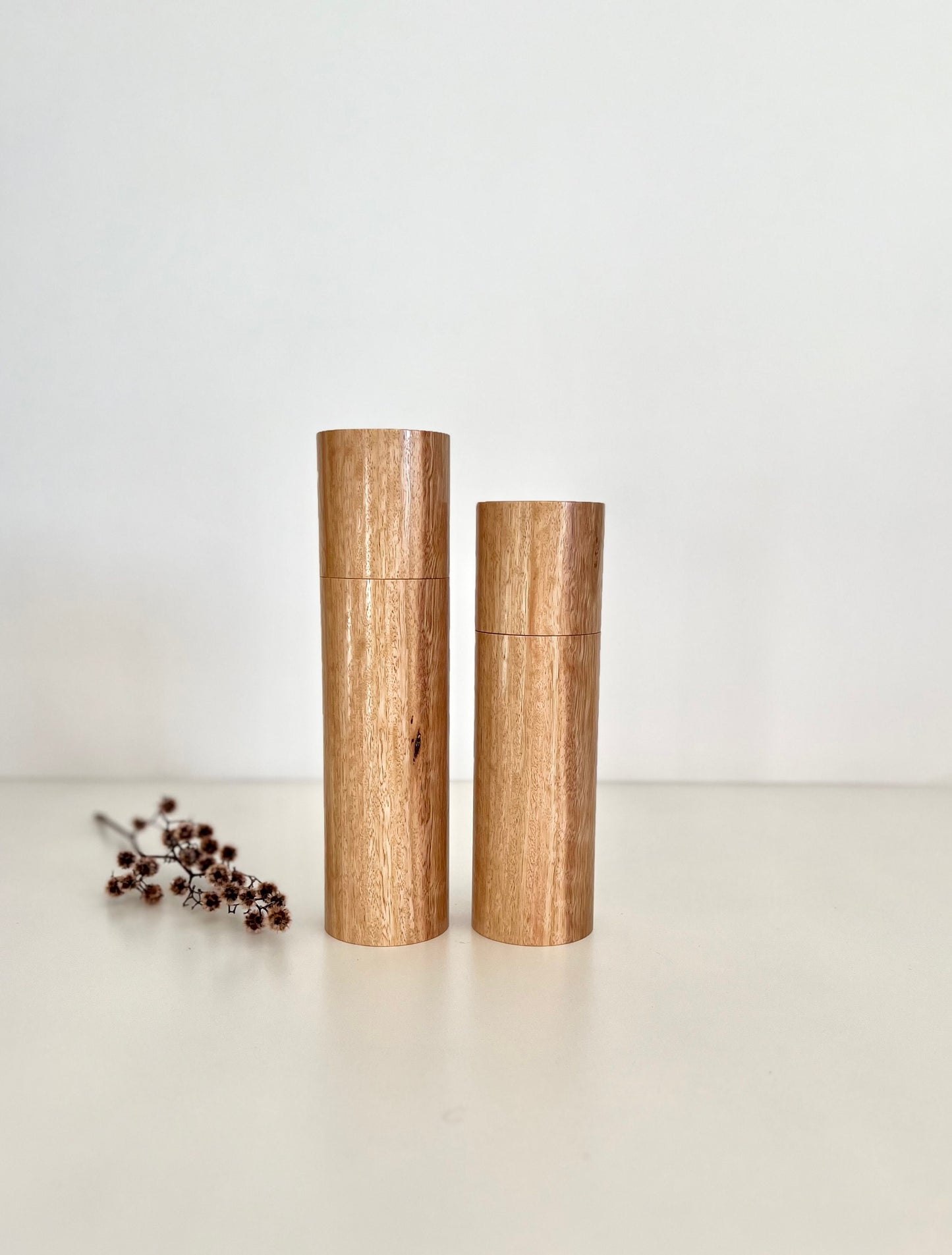 Wooden cylindrical shape salt and pepper grinders made from Australian Tasmanian Blue gum timber