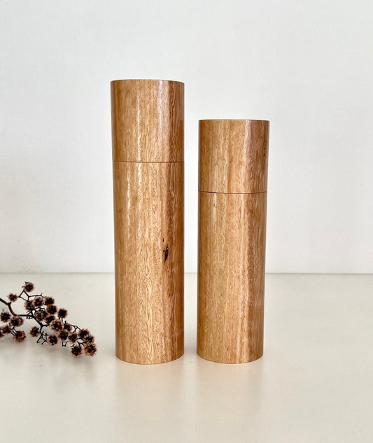 Wooden cylindrical shape salt and pepper grinders made from Australian Tasmanian Blue gum timber