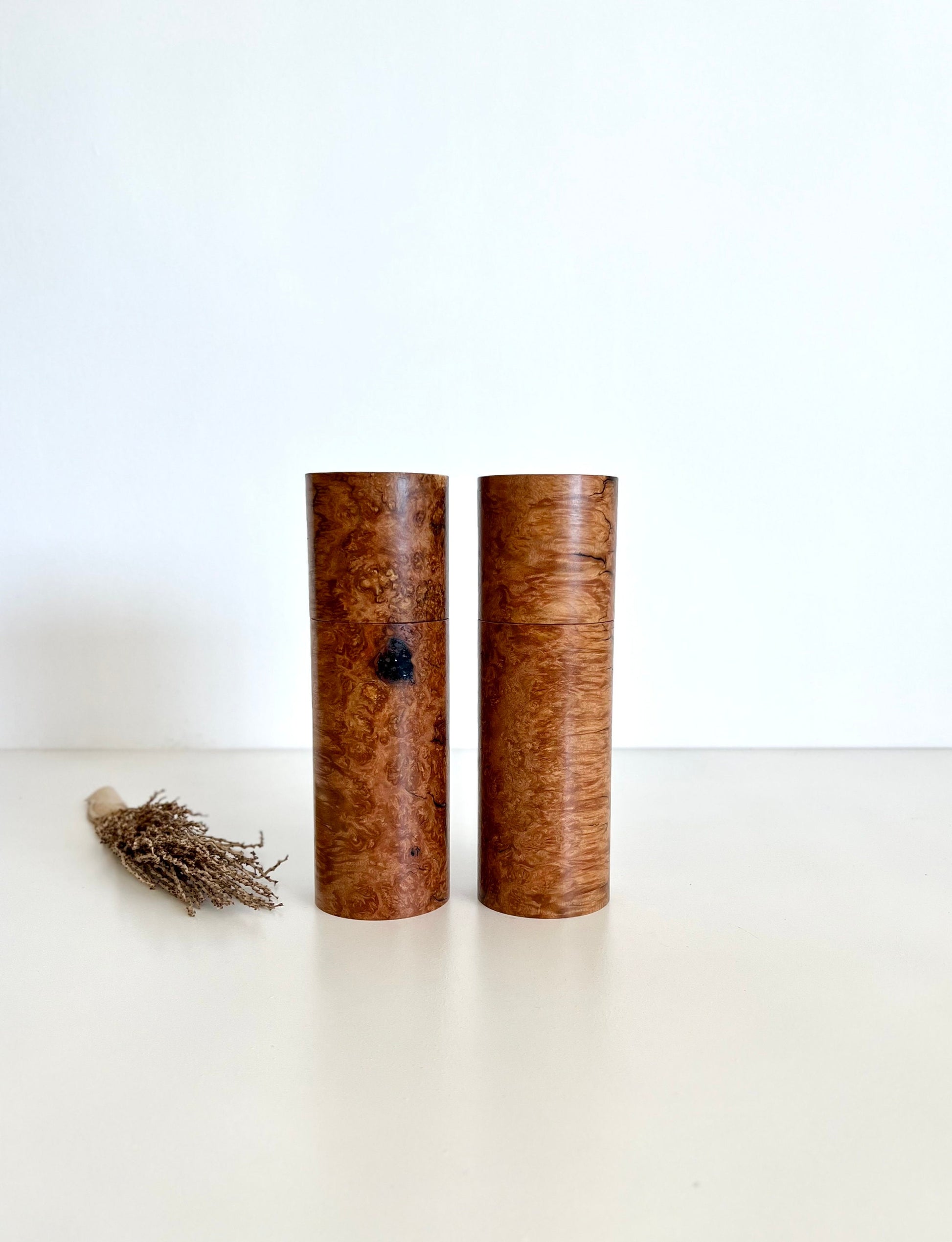 Wooden cylindrical shape salt and pepper grinders made from Australian Sugar gum timbers