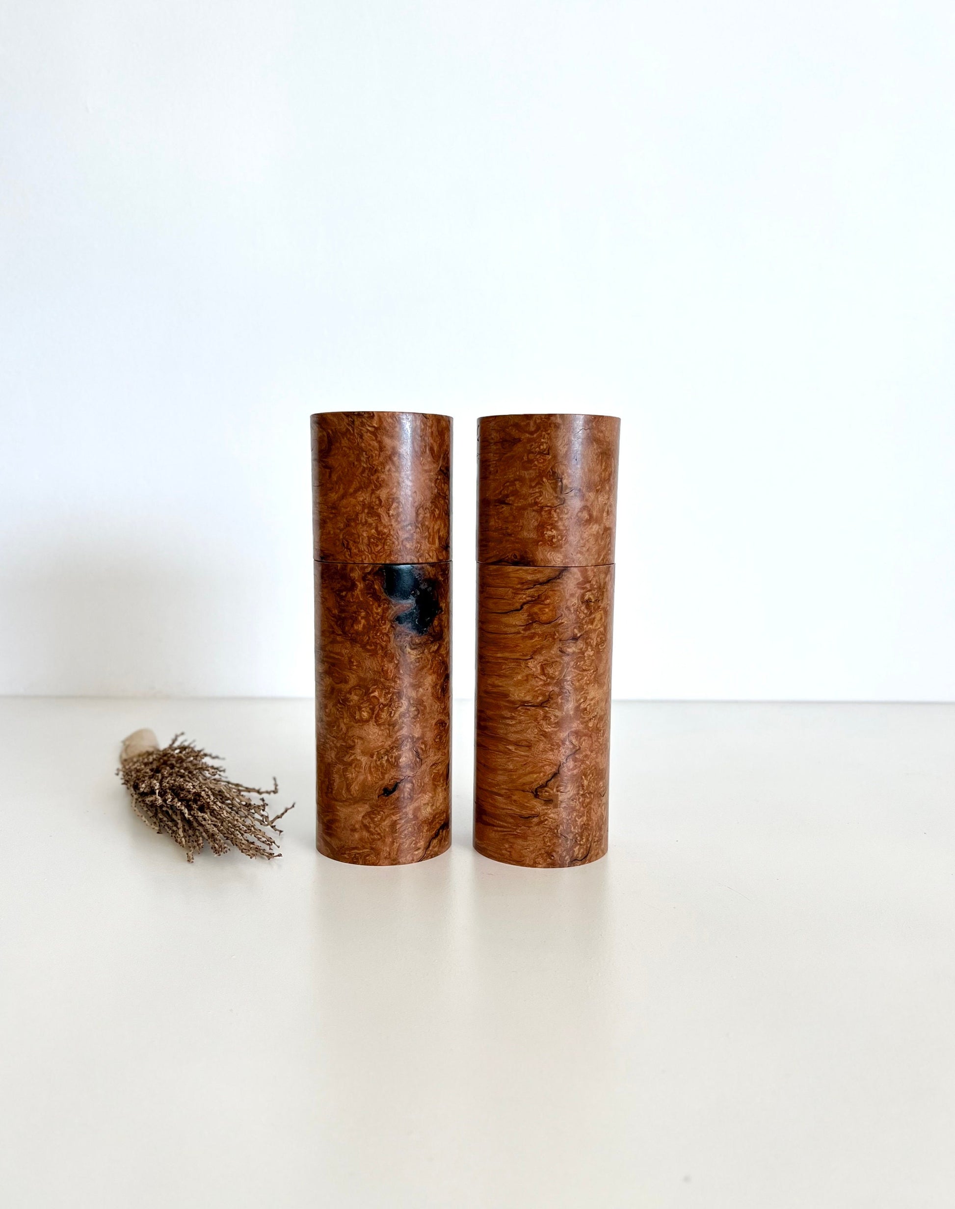 Wooden cylindrical shape salt and pepper grinders made from Australian Sugar gum timbers