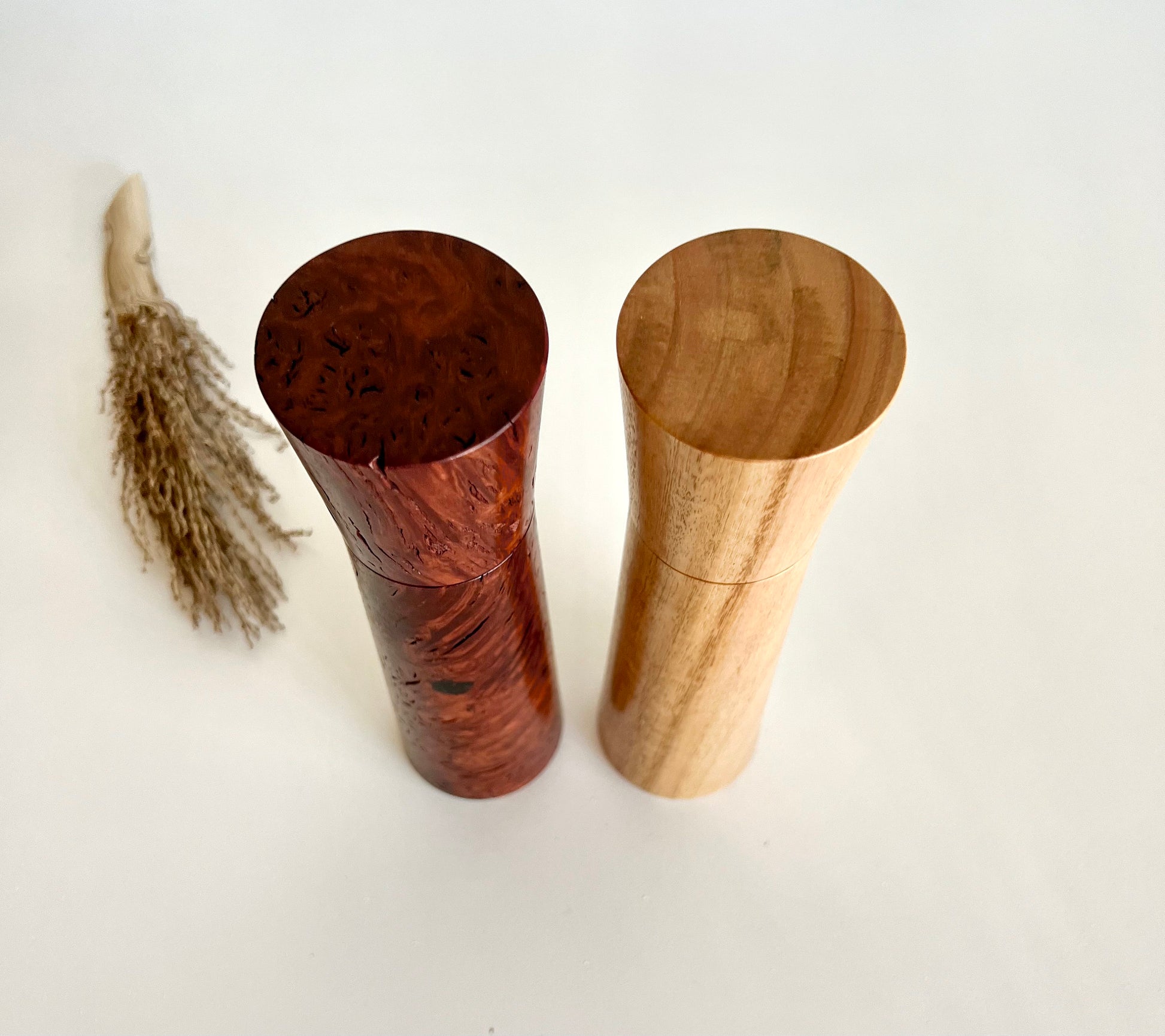 Birdseye view of wooden tapered shape salt and pepper grinders made from Australian Jarrah burl and blackbutt timbers