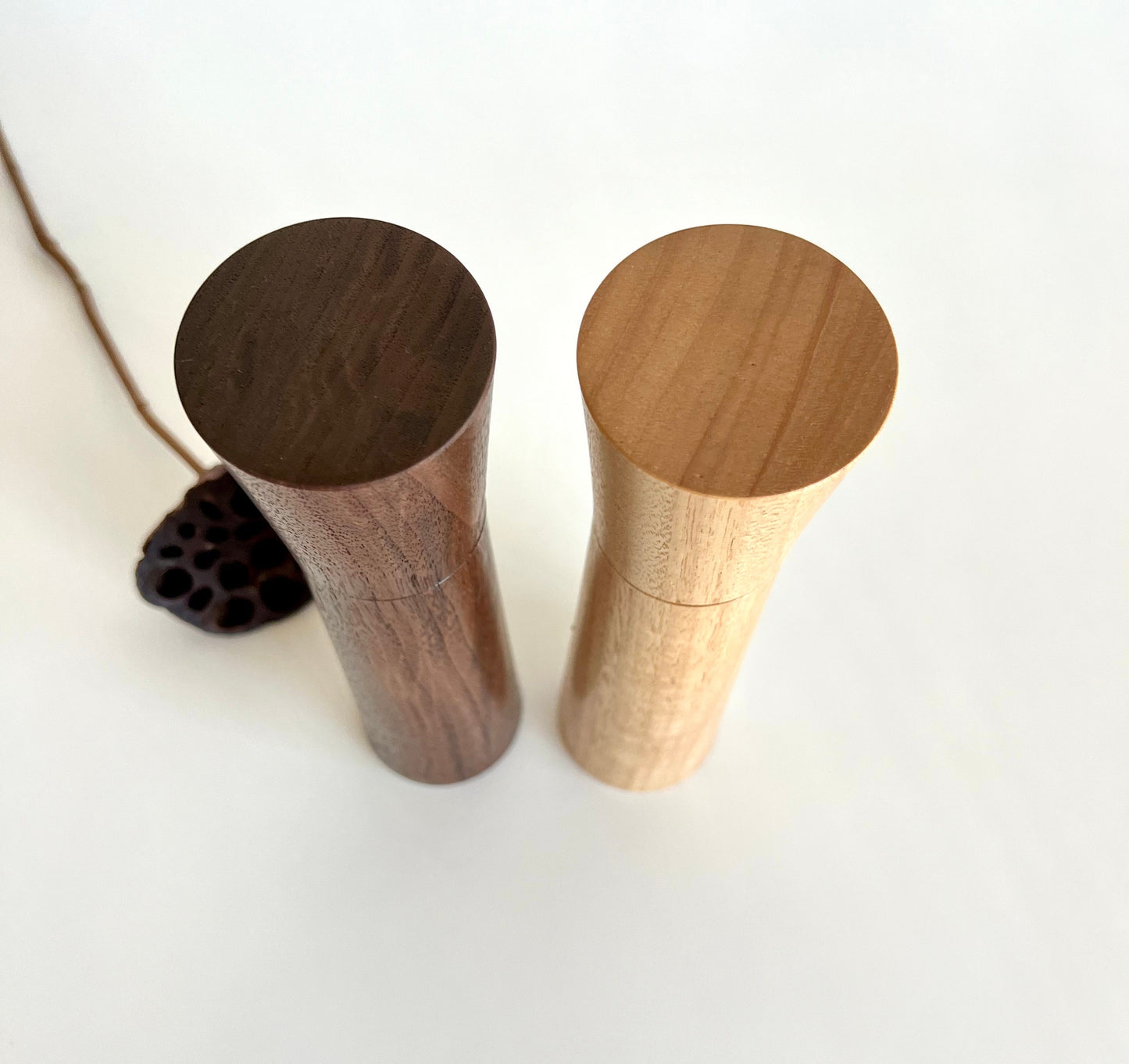 Birdseye view of wooden tapered shape salt and pepper grinders made from Australian Walnut and blackbutt timbers