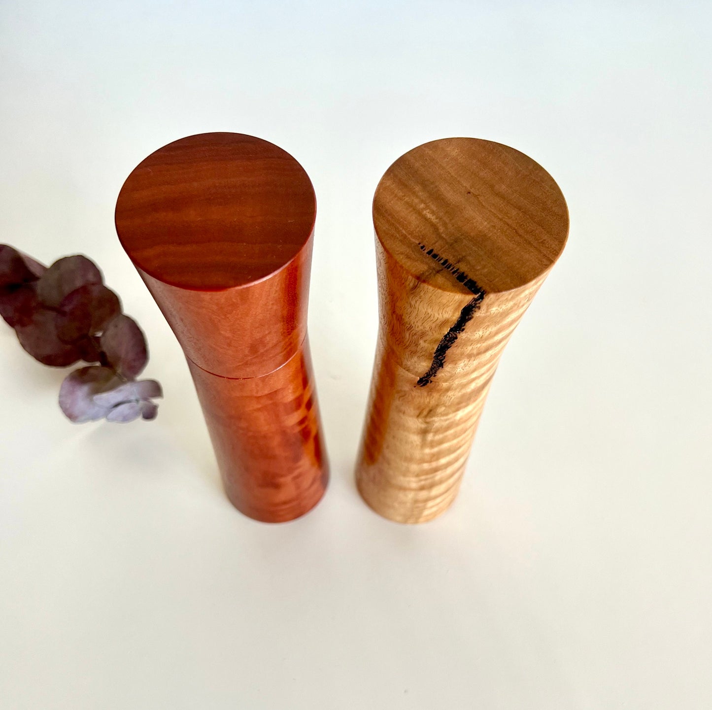 Birdseye view of wooden tapered shape salt and pepper grinders made from Australian Marri and river red gum timbers