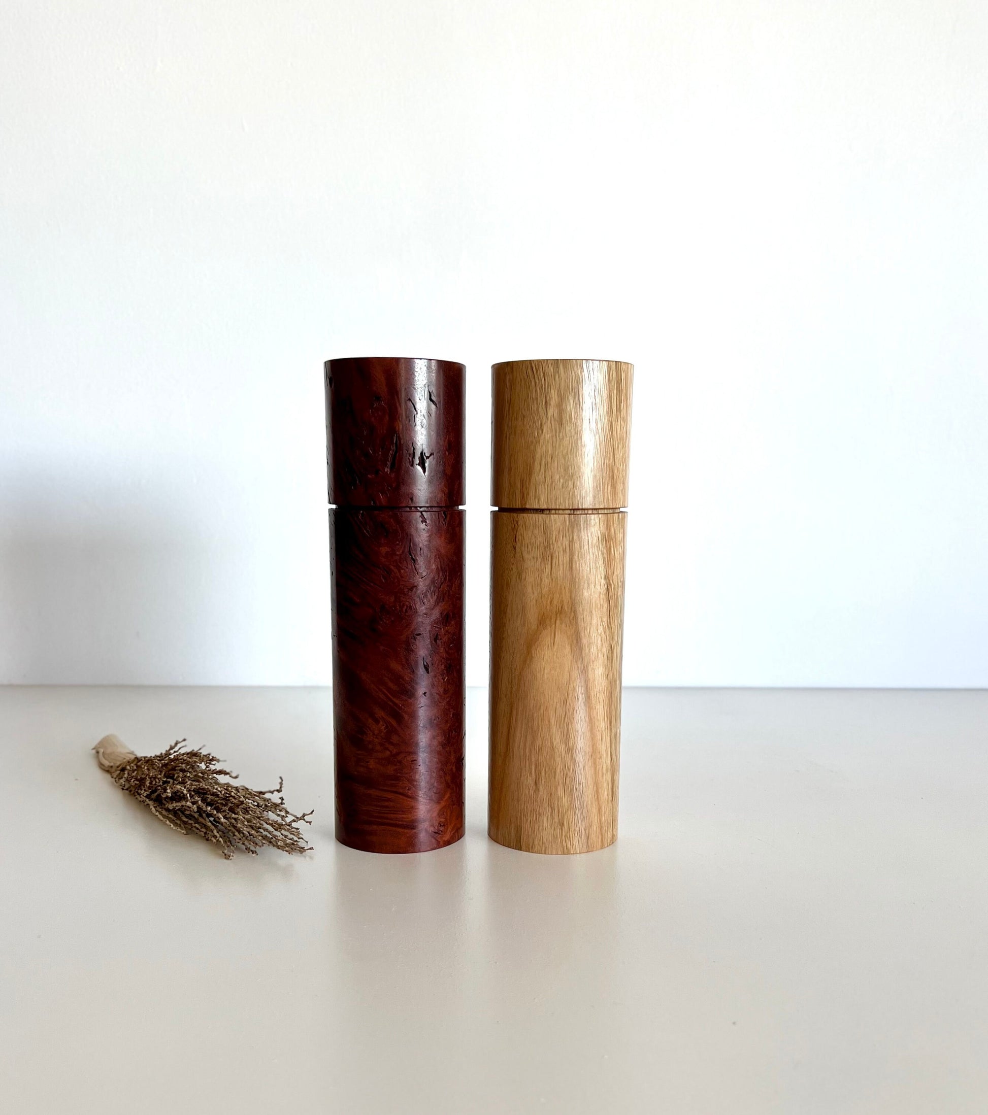 Wooden cylindrical shape salt and pepper grinders made from Australian Jarrah burl and Blackbutt timbers