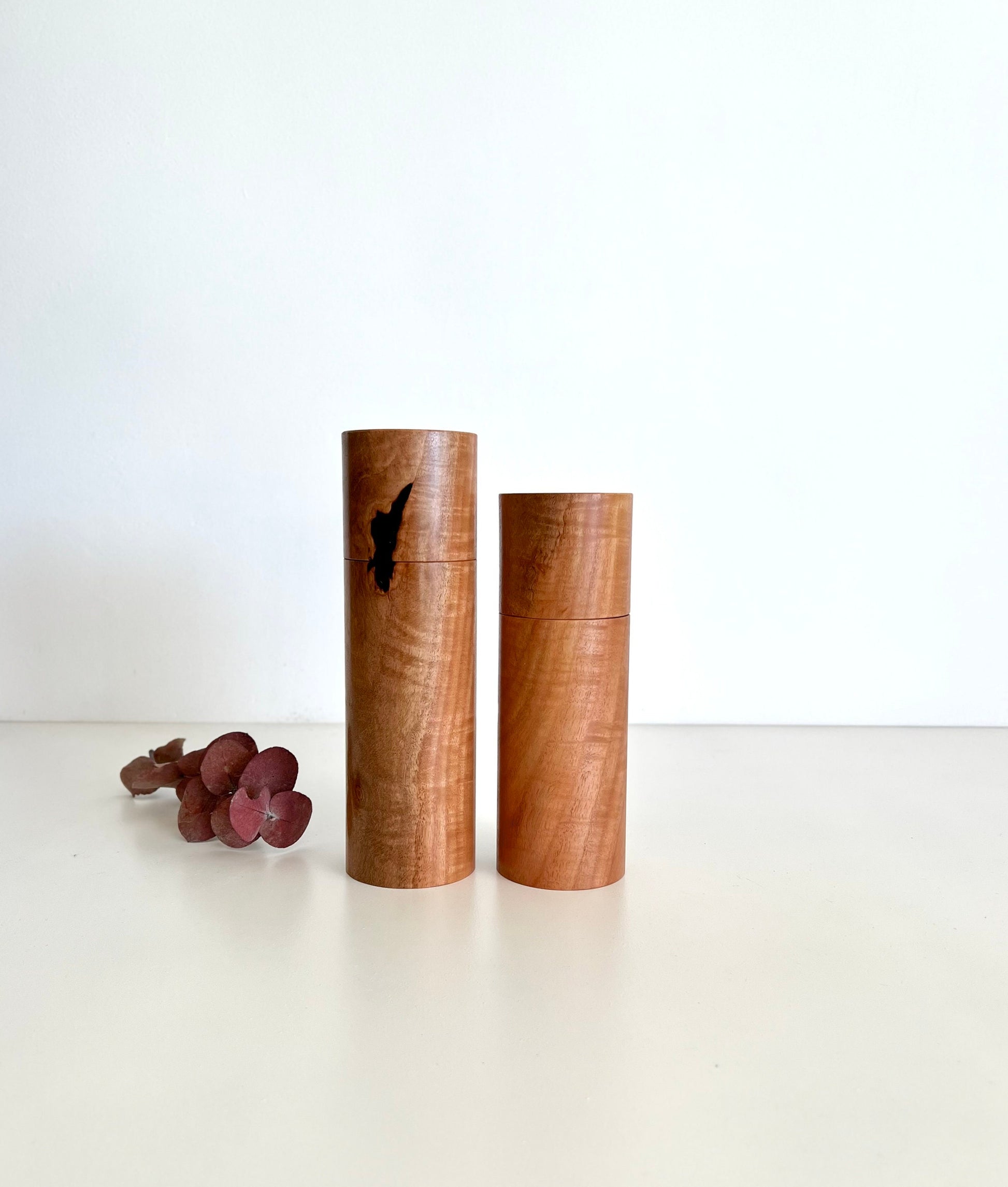 Wooden cylindrical shape salt and pepper grinders made from Australian River red gum timber