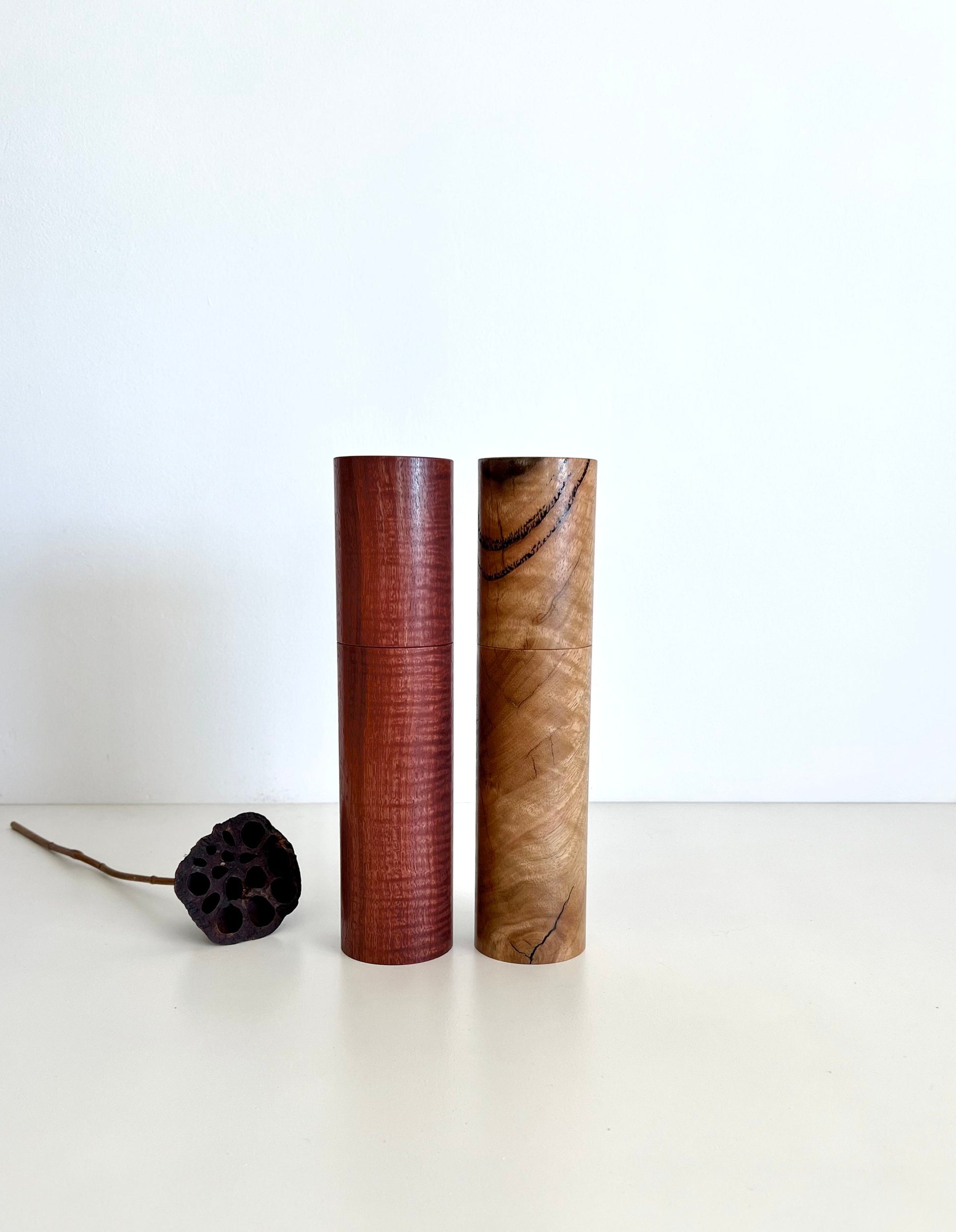 Wooden cylindrical shape salt and pepper grinders made from Australian Jarrah and Marri timbers