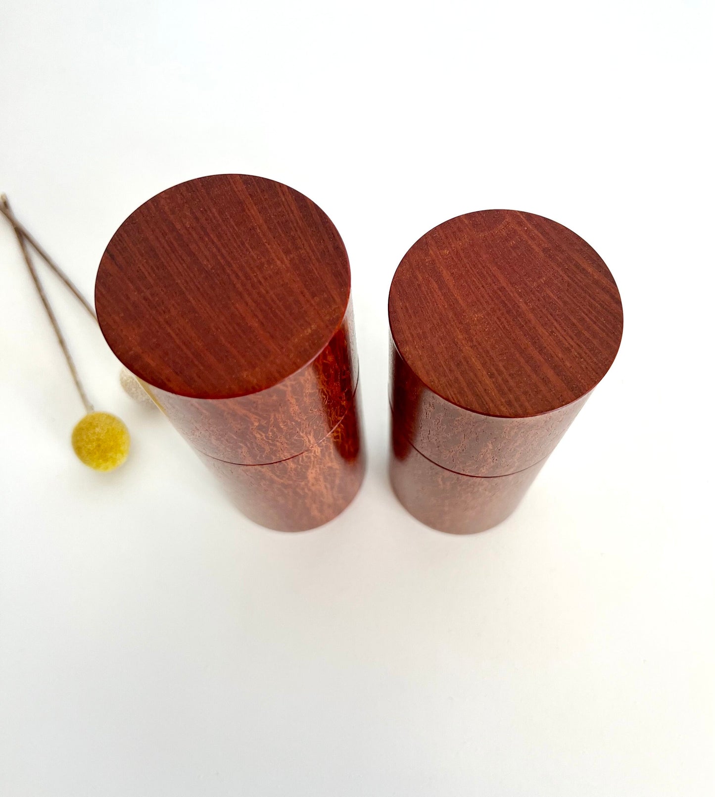 Birdseye view of wooden cylindrical shape salt and pepper grinders made from Australian Lace Sheoak timber.