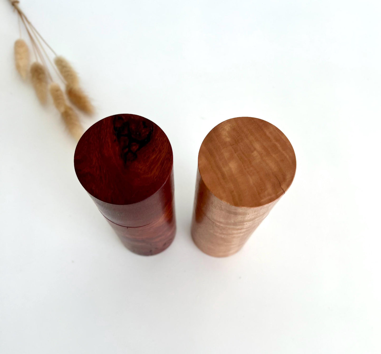 Birdseye view of wooden cylindrical shape salt and pepper grinders made from Australian Jarrah and Blackbutt timbers