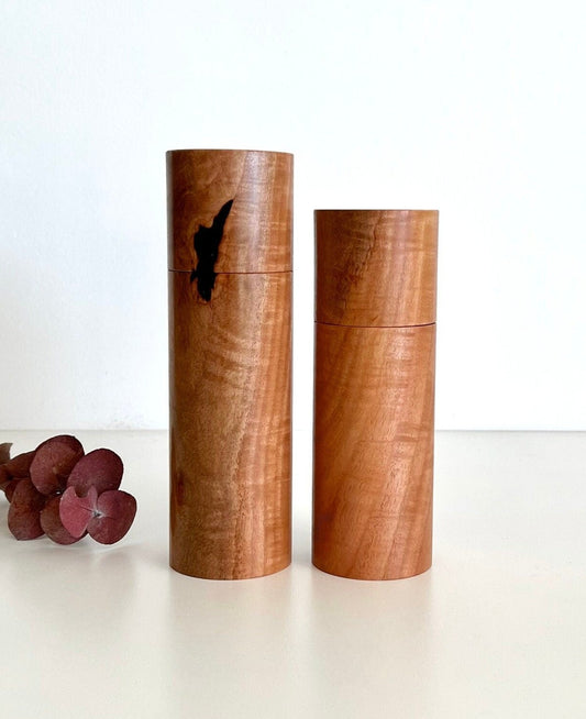 Wooden cylindrical shape salt and pepper grinders made from Australian River red gum timber