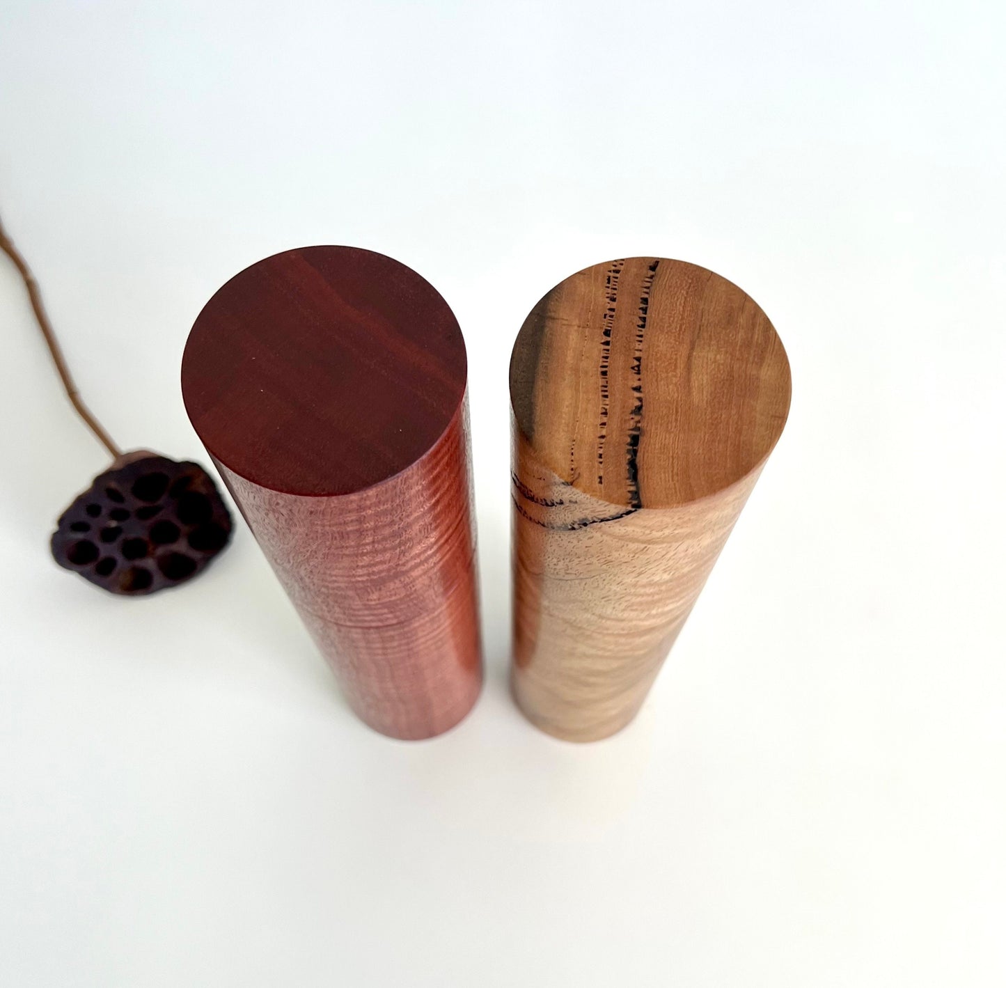 Birdseye view of wooden cylindrical shape salt and pepper grinders made from Australian Jarrah and Marri timbers