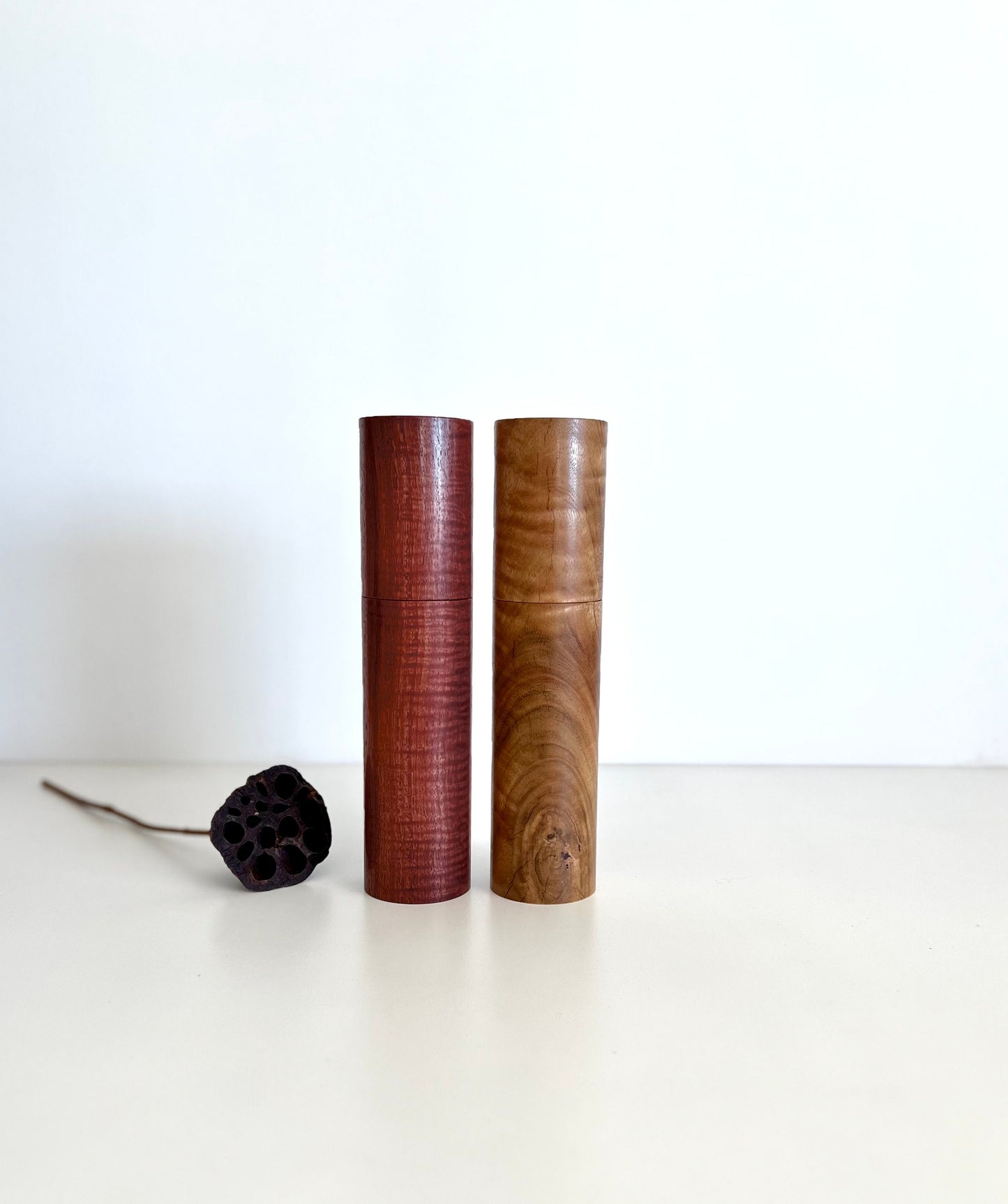 Wooden cylindrical shape salt and pepper grinders made from Australian Jarrah and Marri timbers