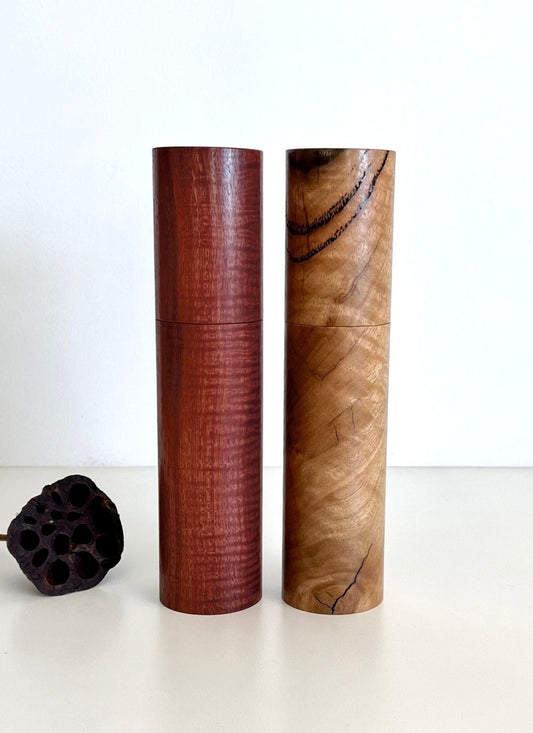 Wooden cylindrical shape salt and pepper grinders made from Australian Jarrah and Marri timbers