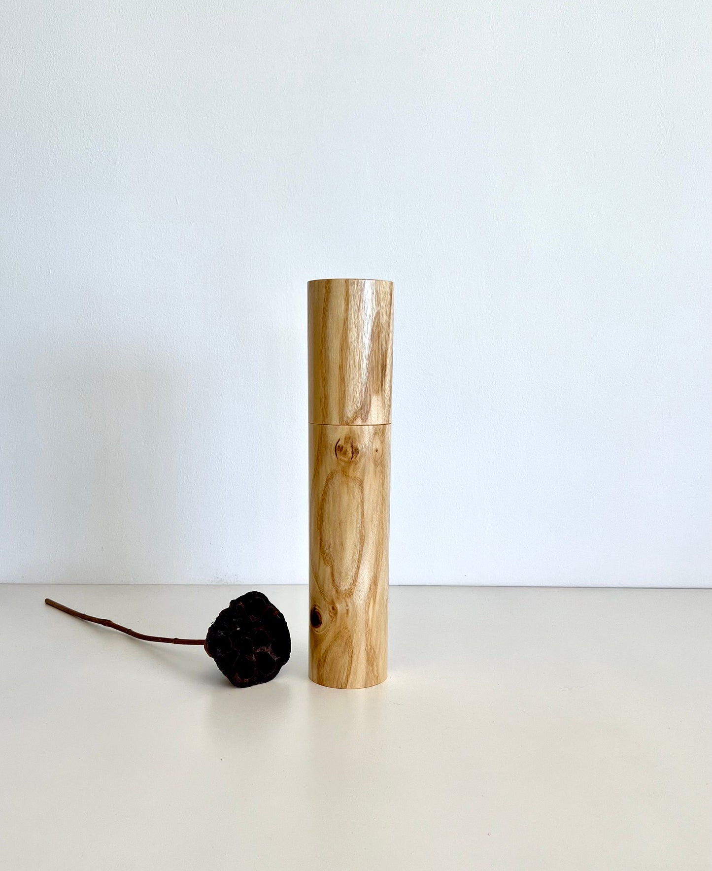 Wooden cylindrical shape salt and pepper grinder made from Australian Mulberry timber