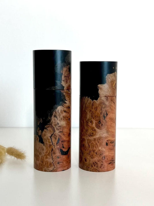 Wooden cylindrical shape salt and pepper grinders made from Australian Jarrah burl timber and Epoxy resin.