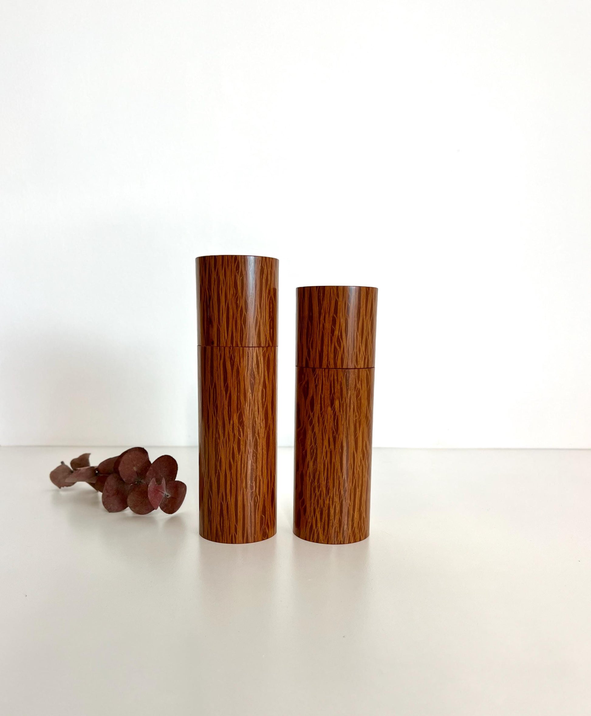 Wooden cylindrical shape salt and pepper grinders made from Sheoak timber