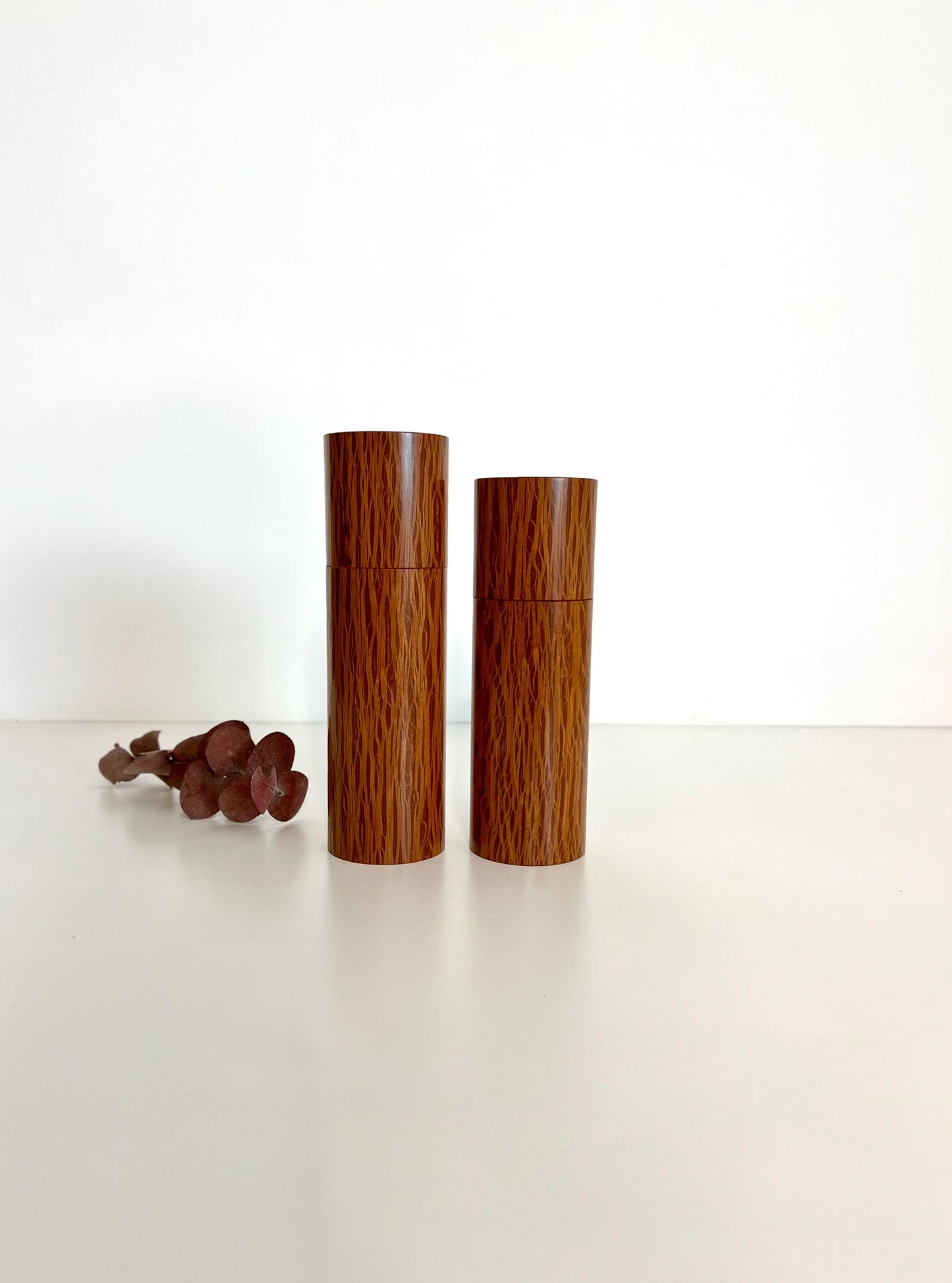 Wooden cylindrical shape salt and pepper grinders made from Sheoak timber