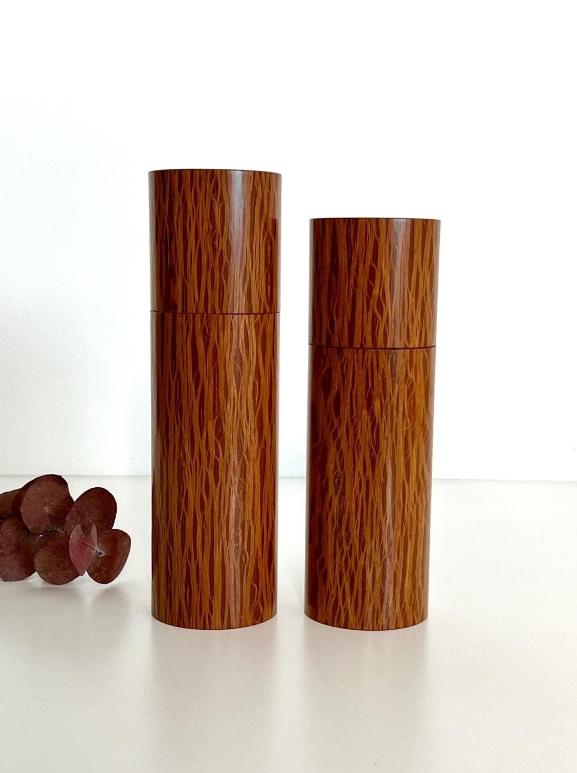 Wooden cylindrical shape salt and pepper grinders made from Sheoak timber