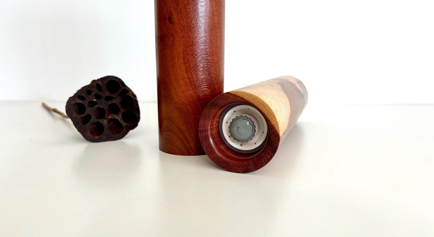 Bottom of salt and pepper grinder showing Crushgrind ceramic grinding mechanism and the adjustment knob