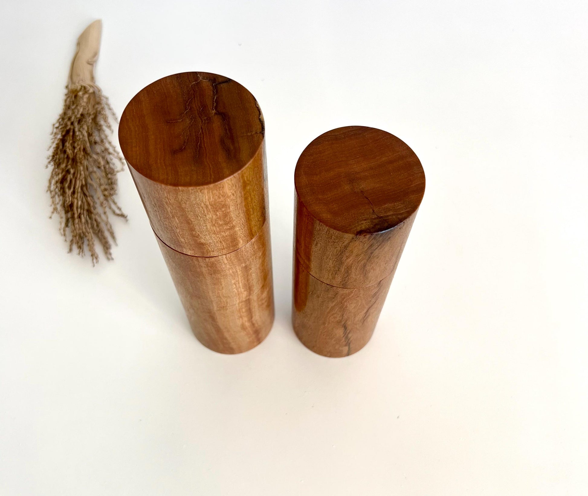 Birdseye view of wooden cylindrical shape salt and pepper grinders made from Australian Wandoo timber