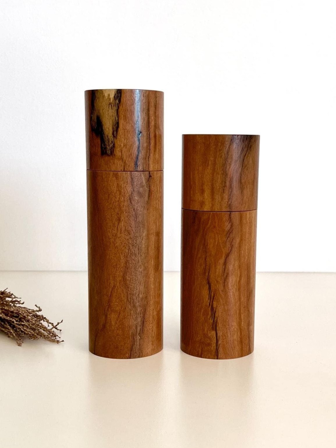 Wooden cylindrical shape salt and pepper grinders made from Wandoo timber