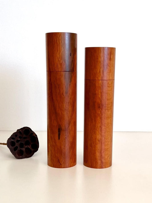 Wooden cylindrical shape salt and pepper grinders made from Lace sheoak timber