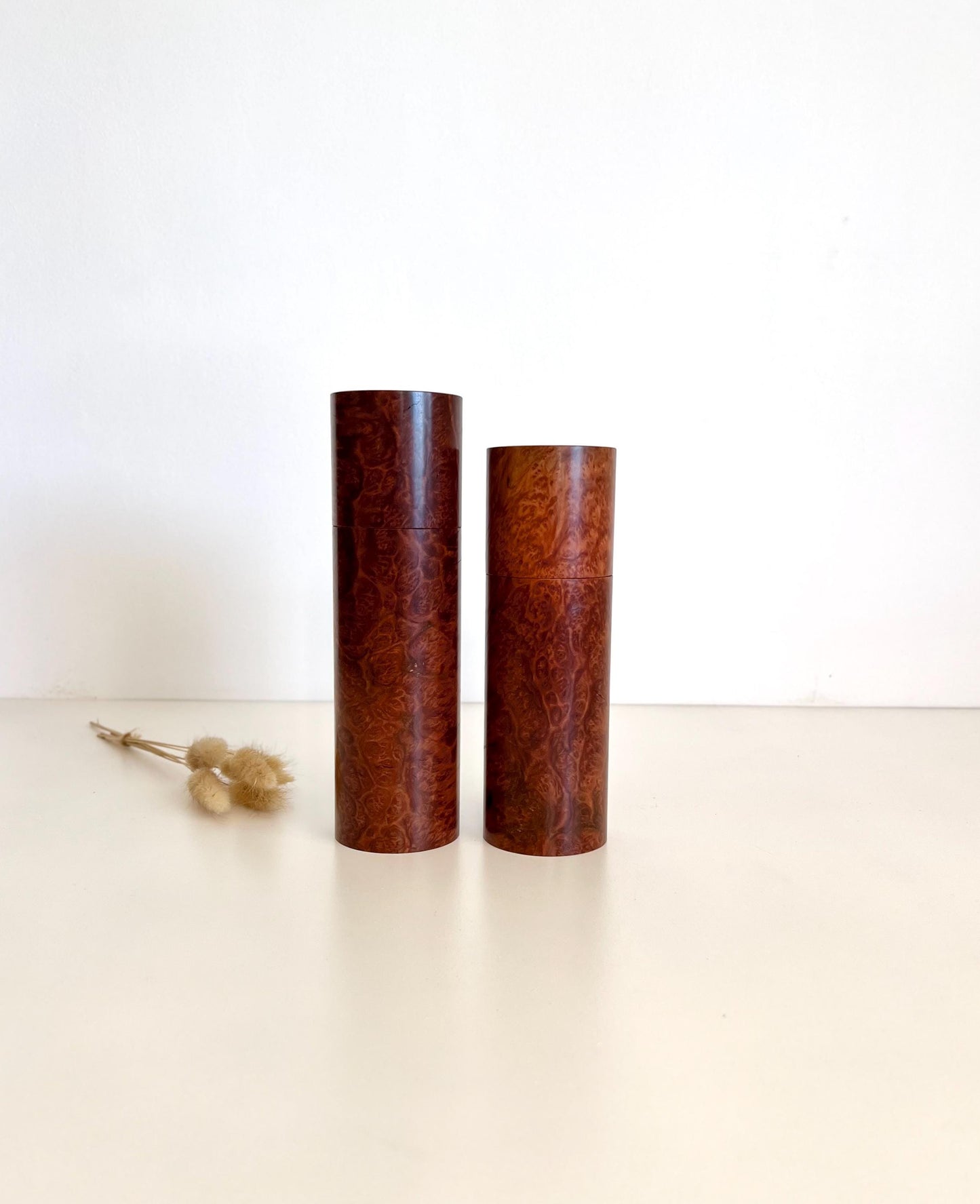 Wooden cylindrical shape salt and pepper grinders made from Red Mallee Burl timber