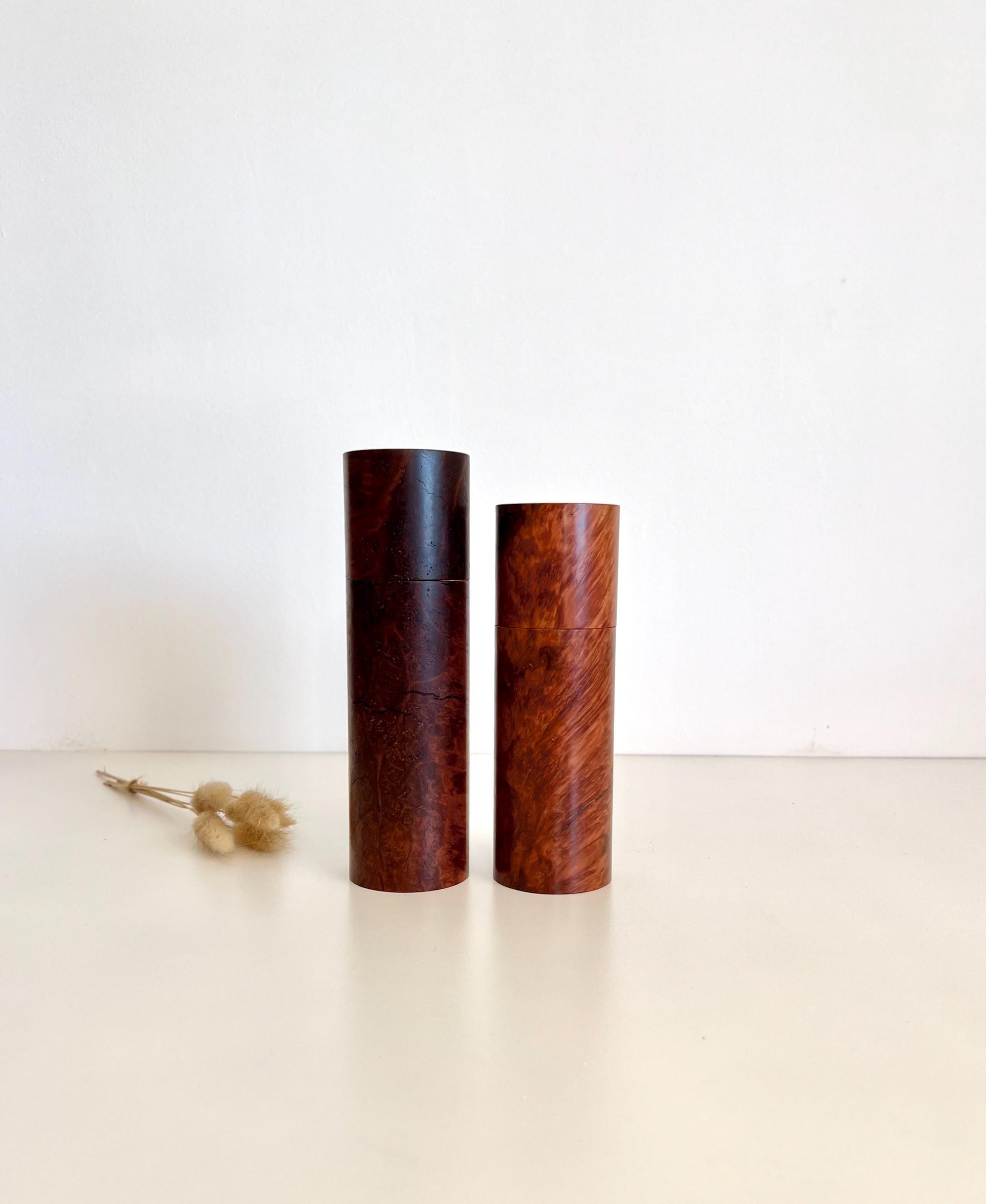 Wooden cylindrical shape salt and pepper grinders made from Red Mallee Burl timber