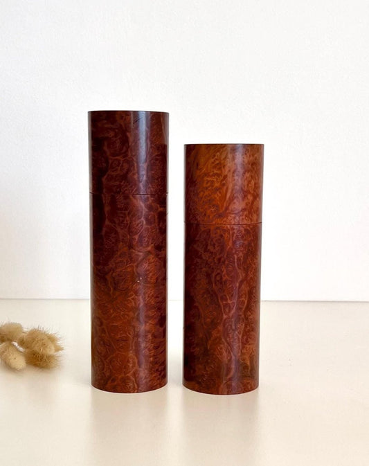 Wooden cylindrical shape salt and pepper grinders made from Red Mallee Burl timber