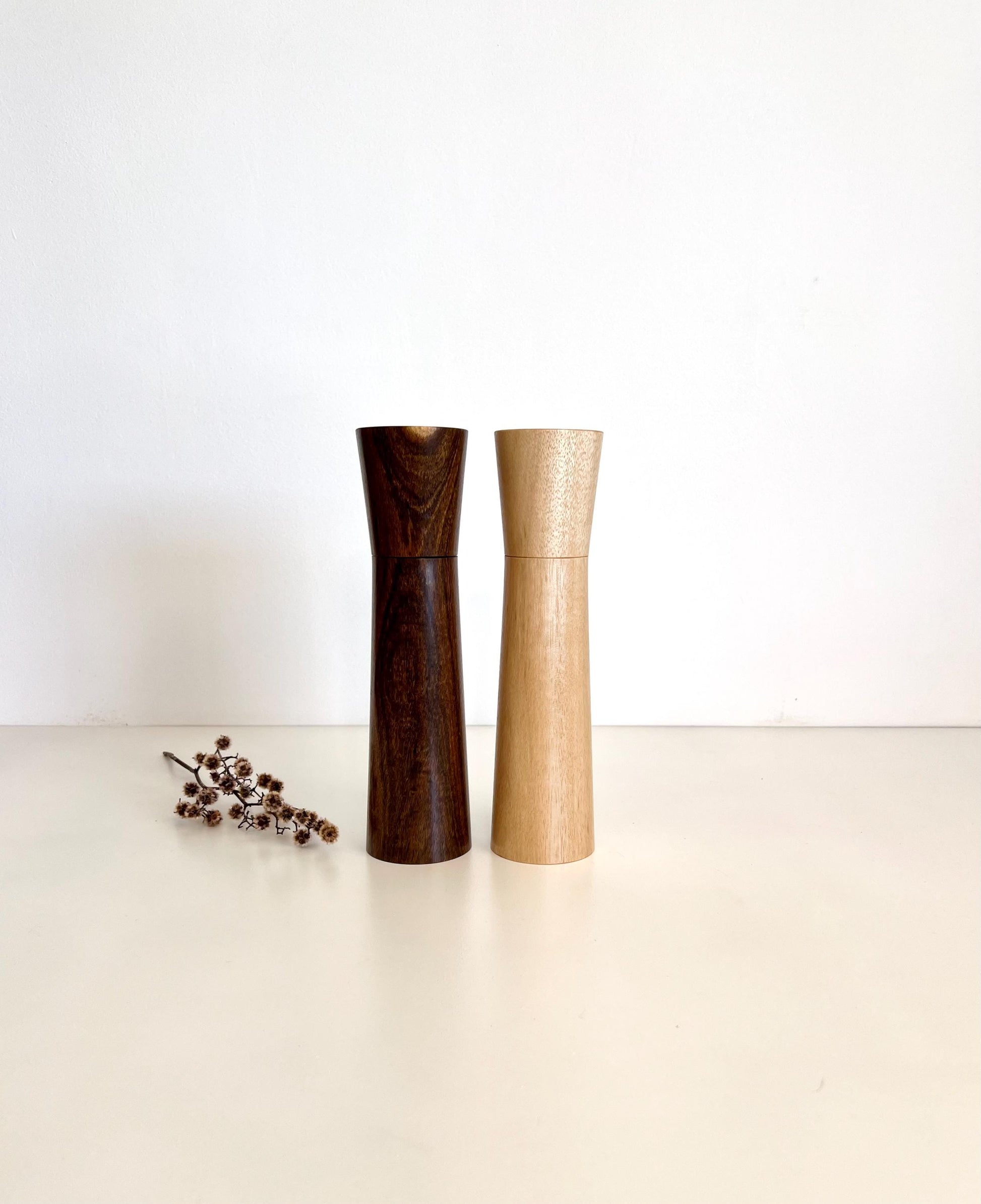 Wooden cylindrical shape salt and pepper grinders made from Western Myall and Blue gum timber