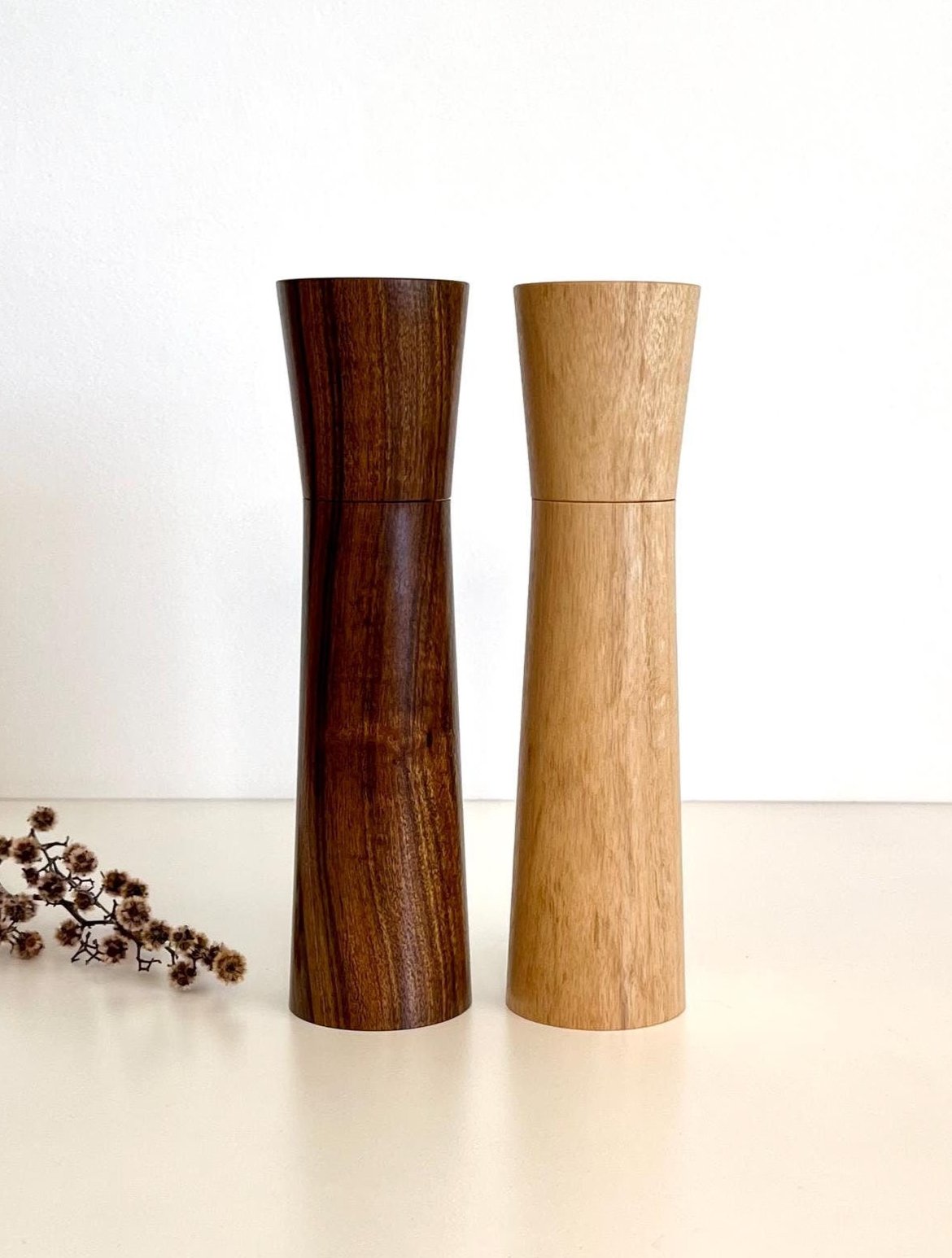 Wooden cylindrical shape salt and pepper grinders made from Western Myall and Blue gum timber