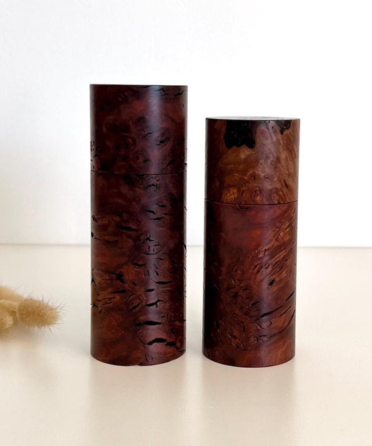 Wooden cylindrical shape salt and pepper grinders made from Australian Jarrah Burl timber