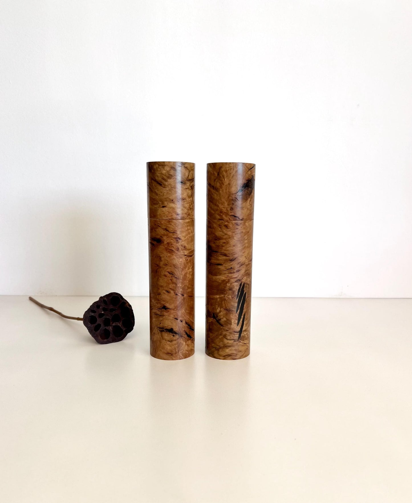 Wooden cylindrical shape salt and pepper grinders made from Australian Bimble Box timber and Black Resin