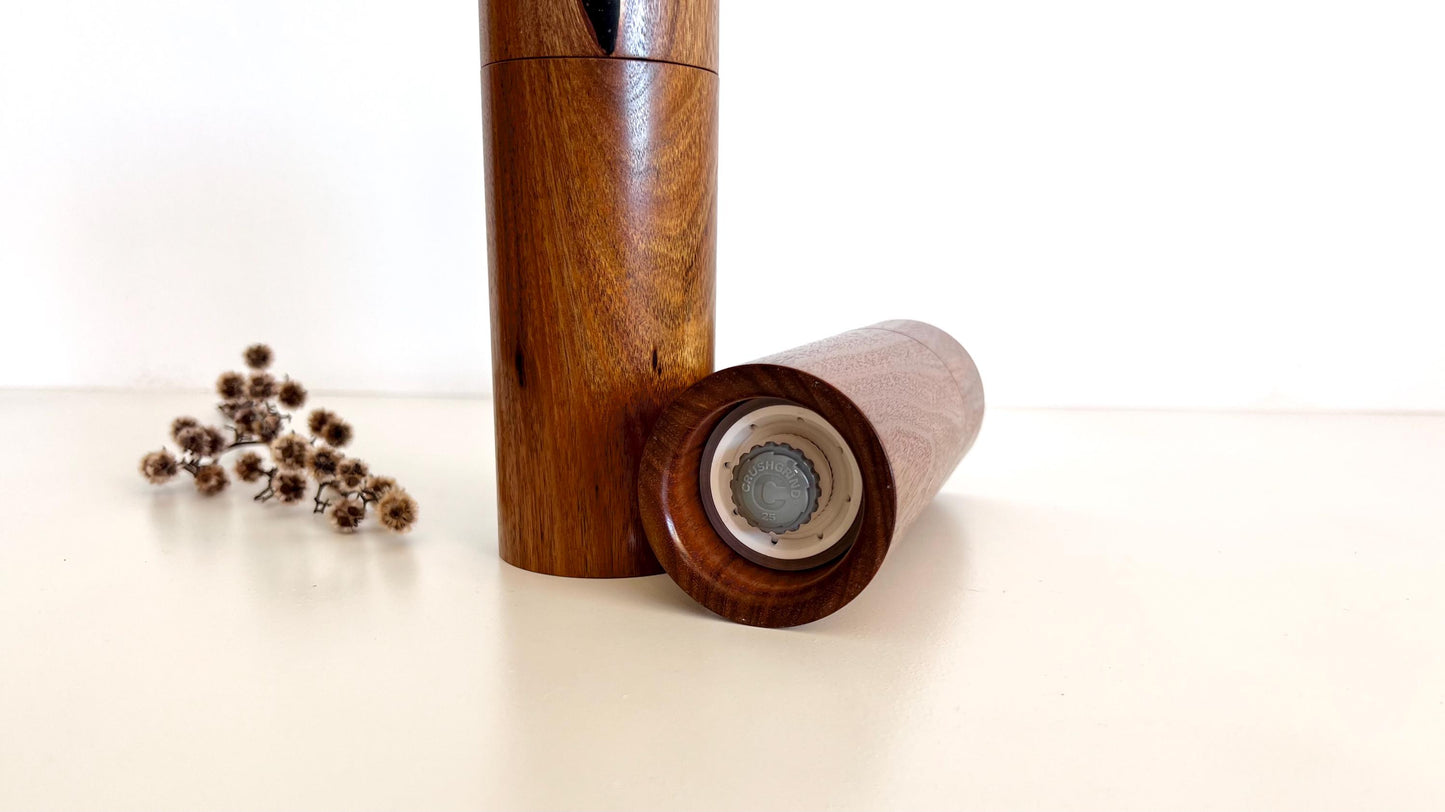 Bottom of salt and pepper grinder showing Crushgrind ceramic grinding mechanism and the adjustment knob