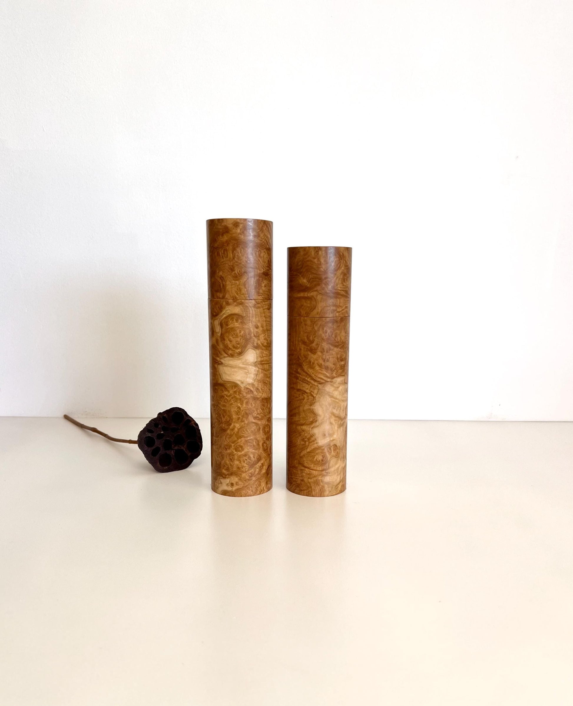 Wooden cylindrical shape salt and pepper grinders made from Australian Yorrel burl timber