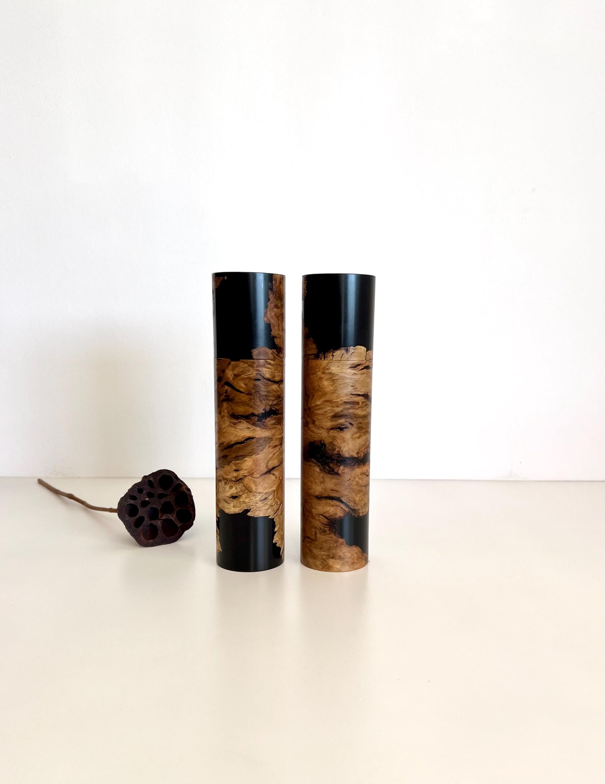 Wooden cylindrical shape salt and pepper grinders made from Australian Bimble Box timber and Black Resin