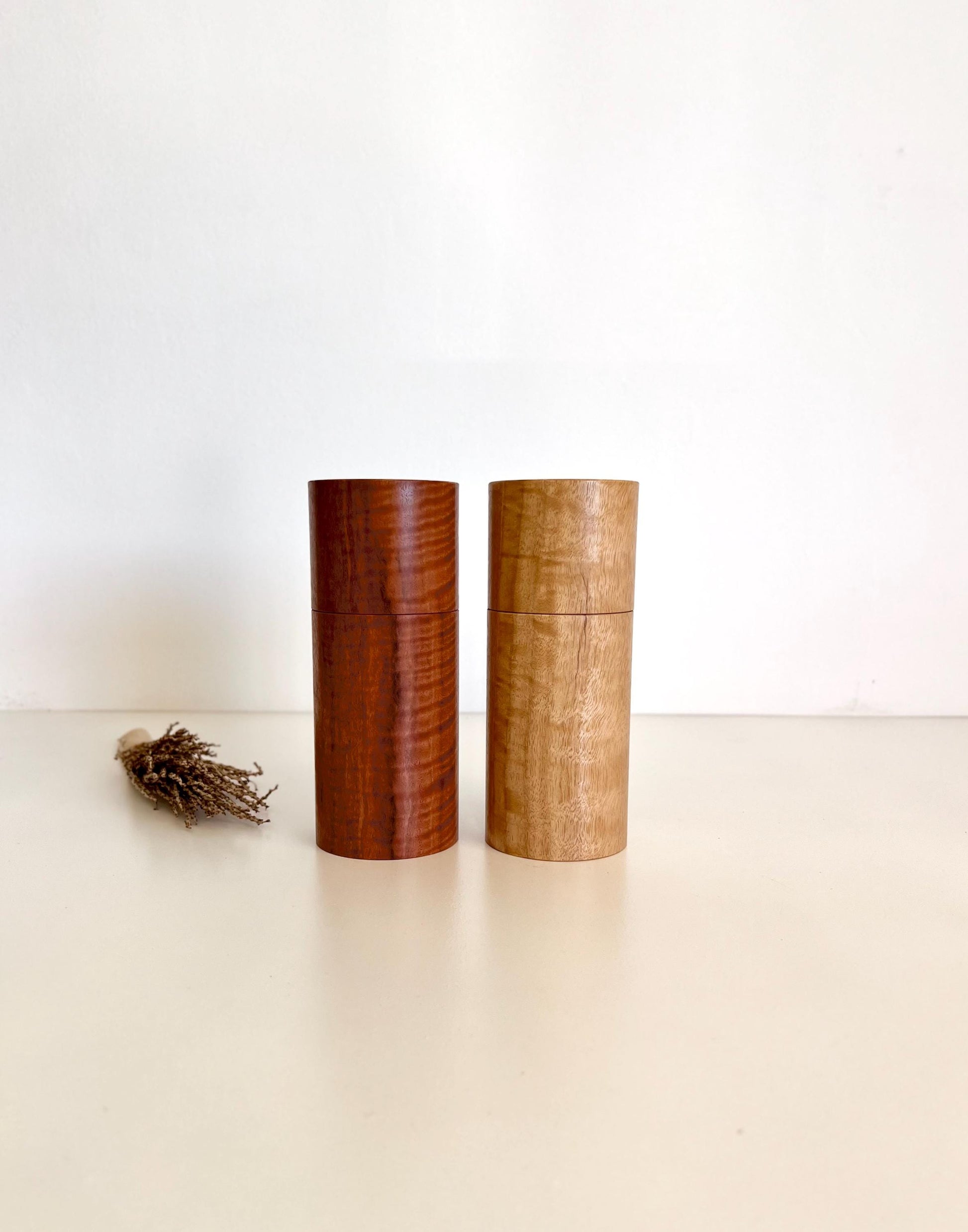 Wooden cylindrical shape salt and pepper grinders made from Wandoo and Marri timbers